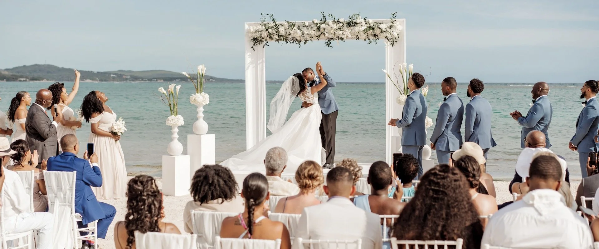 A beach wedding ceremony at Sandals South Coast in Jamaica