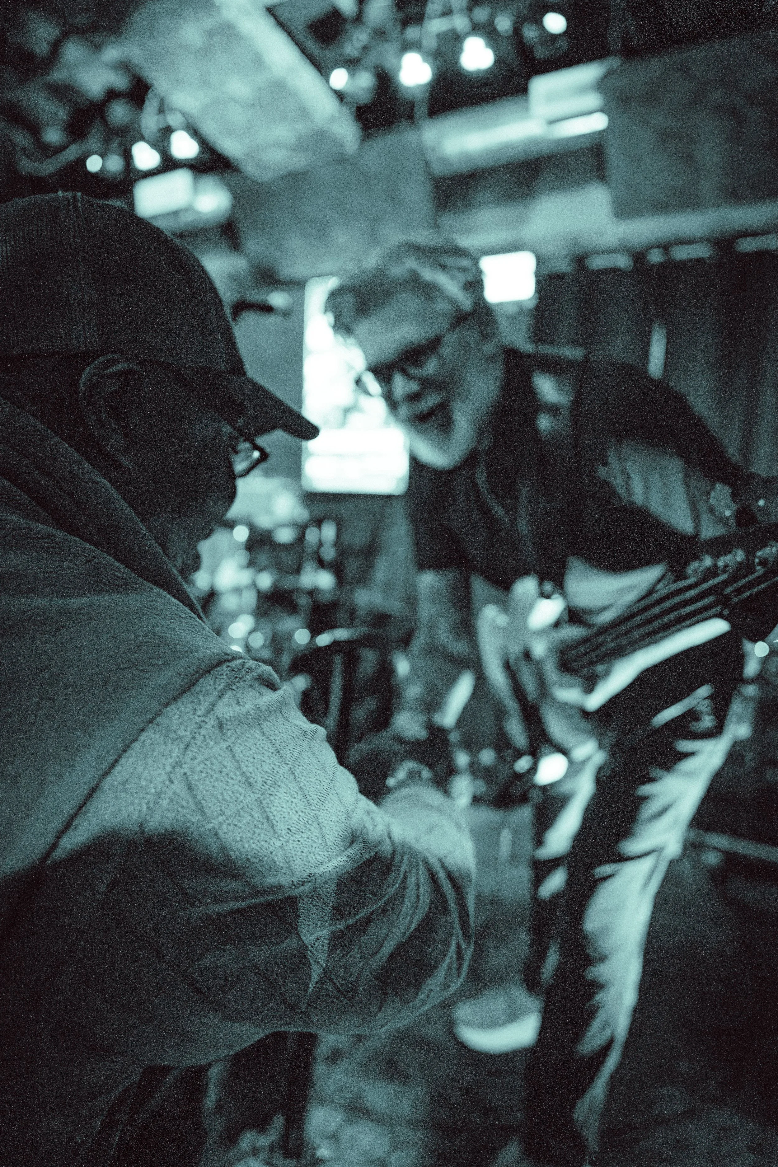 Kip Lohr, bassist for Funk Around & Find Out, interacting with the crowd during a live performance.