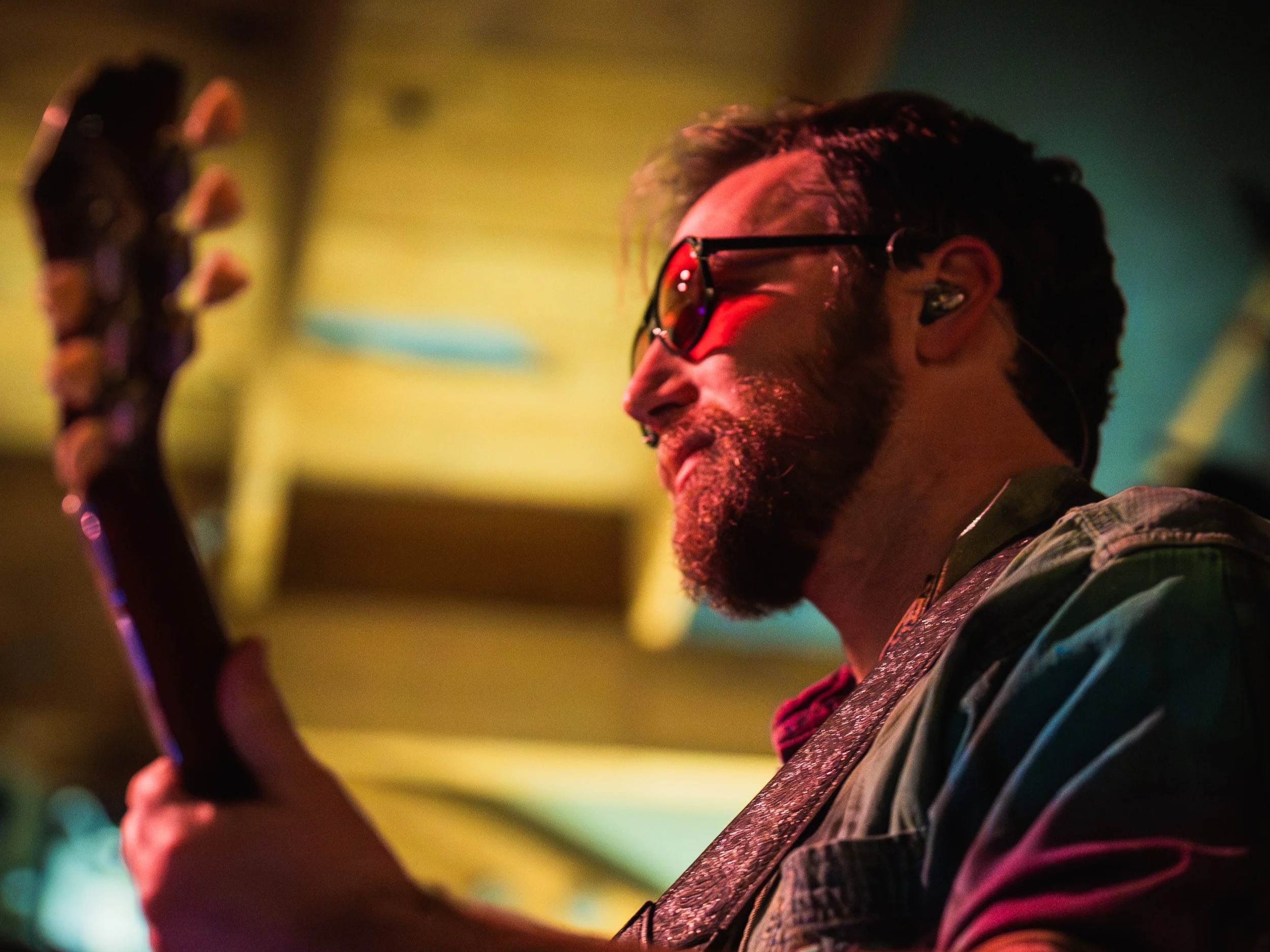 Dan Hiss playing lead guitar during a Funk Around & Find Out performance.