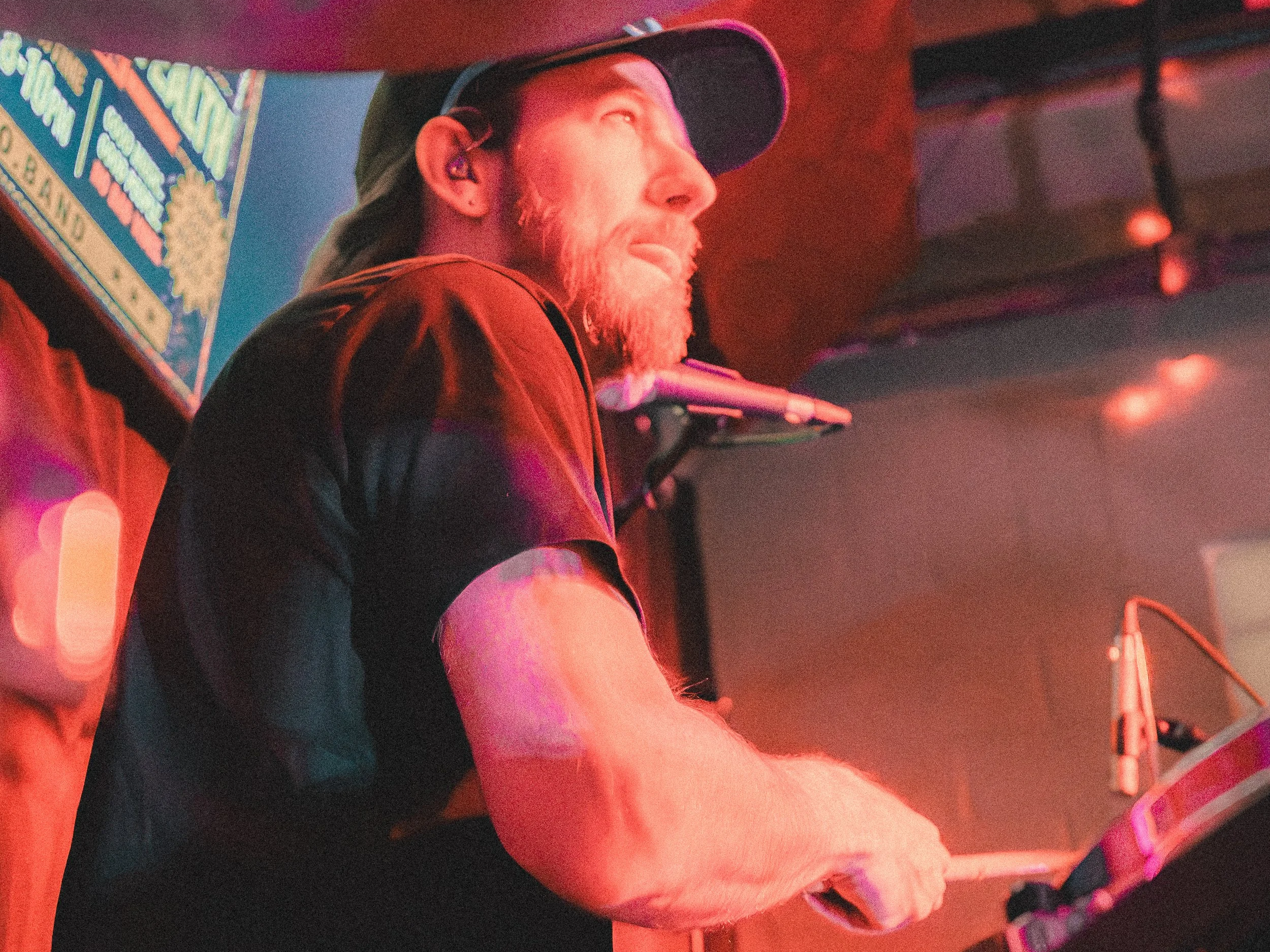 Andy Gentile playing drums during a live FAFO performance.