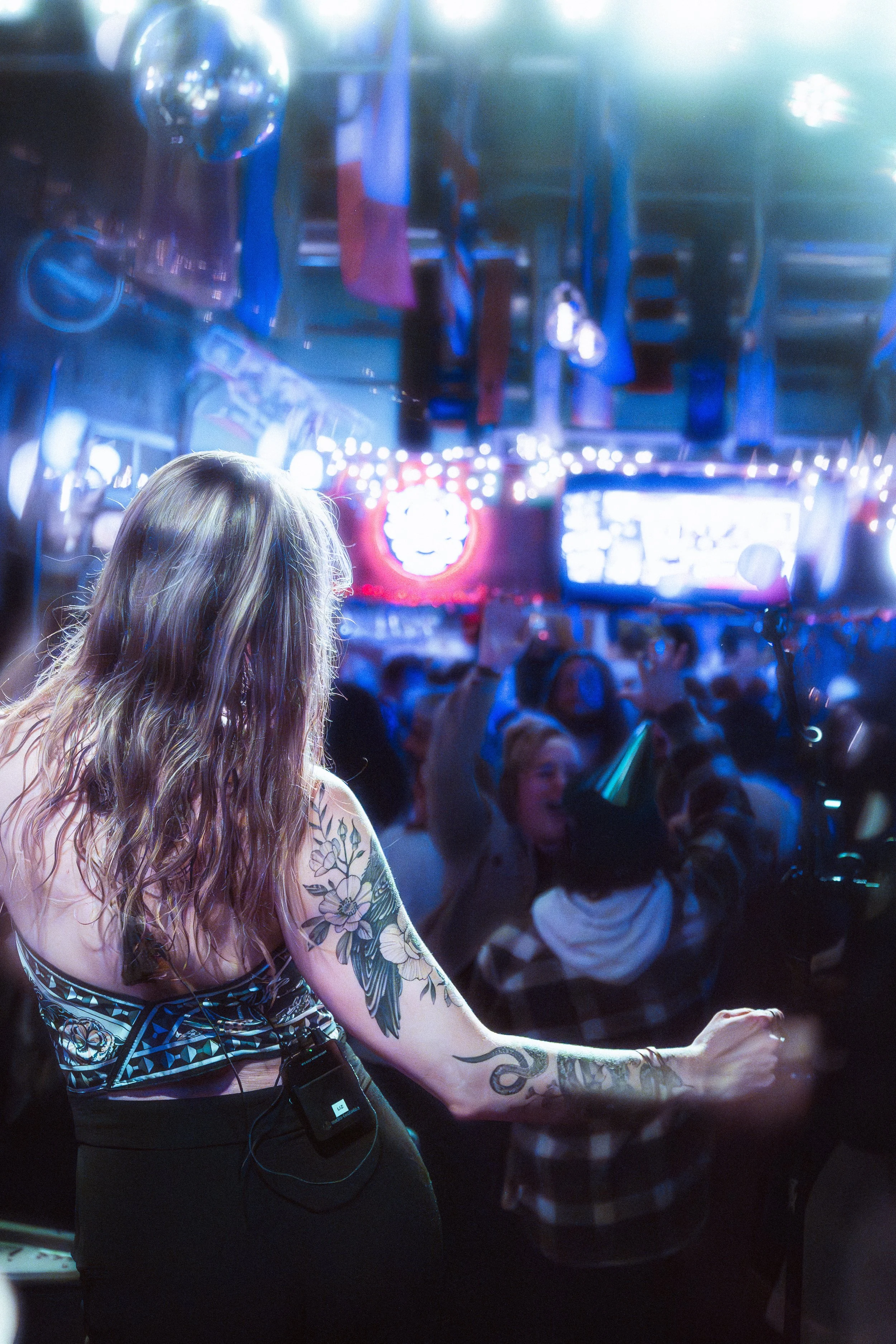 Liz Bauer facing the crowd during a Funk Around & Find Out performance.