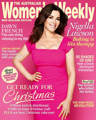 Cover of Australian Women Weekly magazine featuring Nigella Lawson in a pink dress, smiling with one hand on her hip, with headlines about baking, Christmas, and health.
