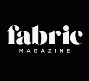 Fabric Magazine logo with white text on a black background.