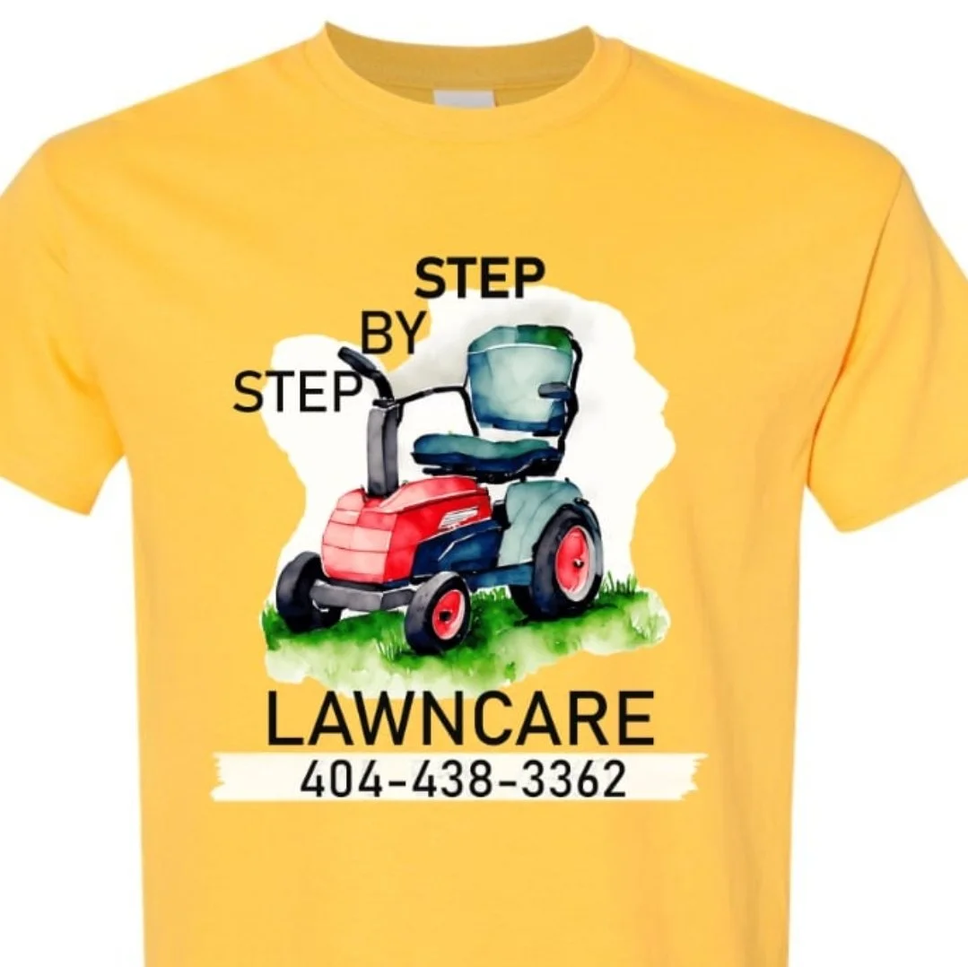 Yellow T-shirt with a colorful illustration of a riding lawnmower, and text that says 'Step by Step Lawncare' with a phone number 404-438-3362.