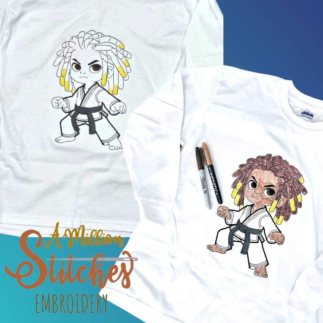 Two white T-shirts with a cartoon of a child in a karate gi with dreadlocks; the left shirt shows a black and white outline, while the right shirt has the same cartoon colored in and is signed with two markers placed on it.
