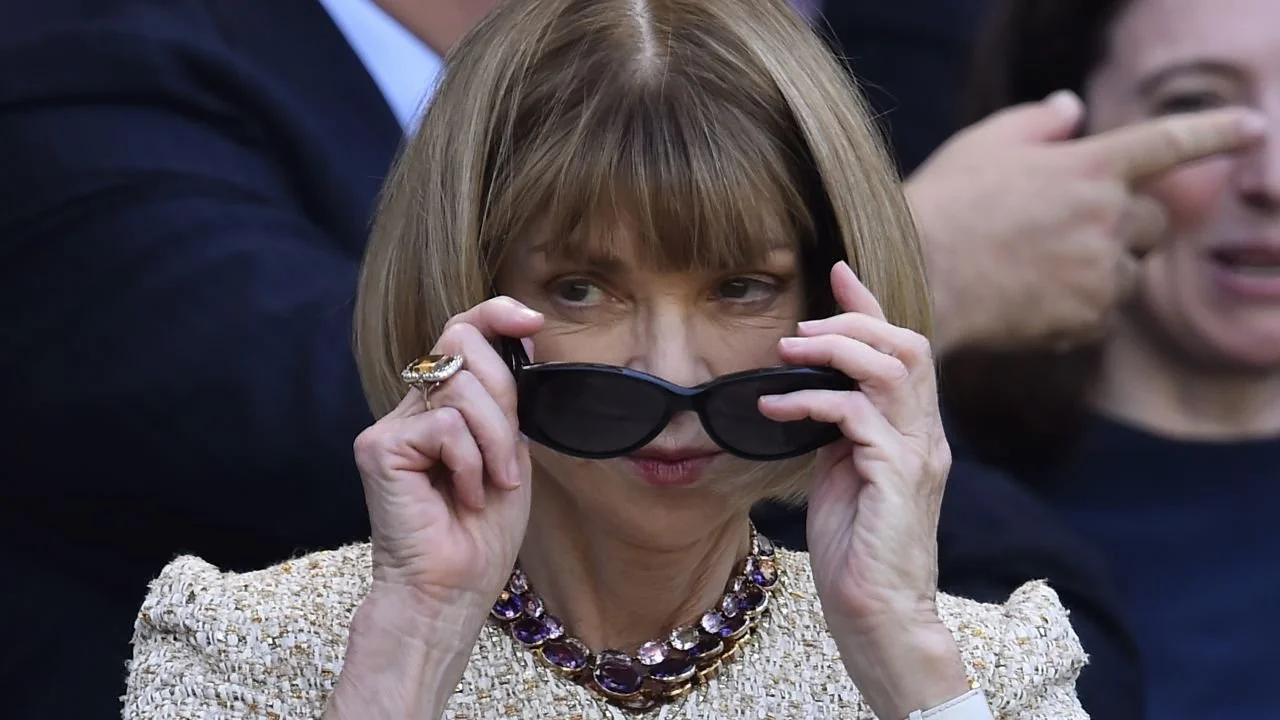 Anna Wintour, famous Vogue Editor in Chief with her signature black sunglasses