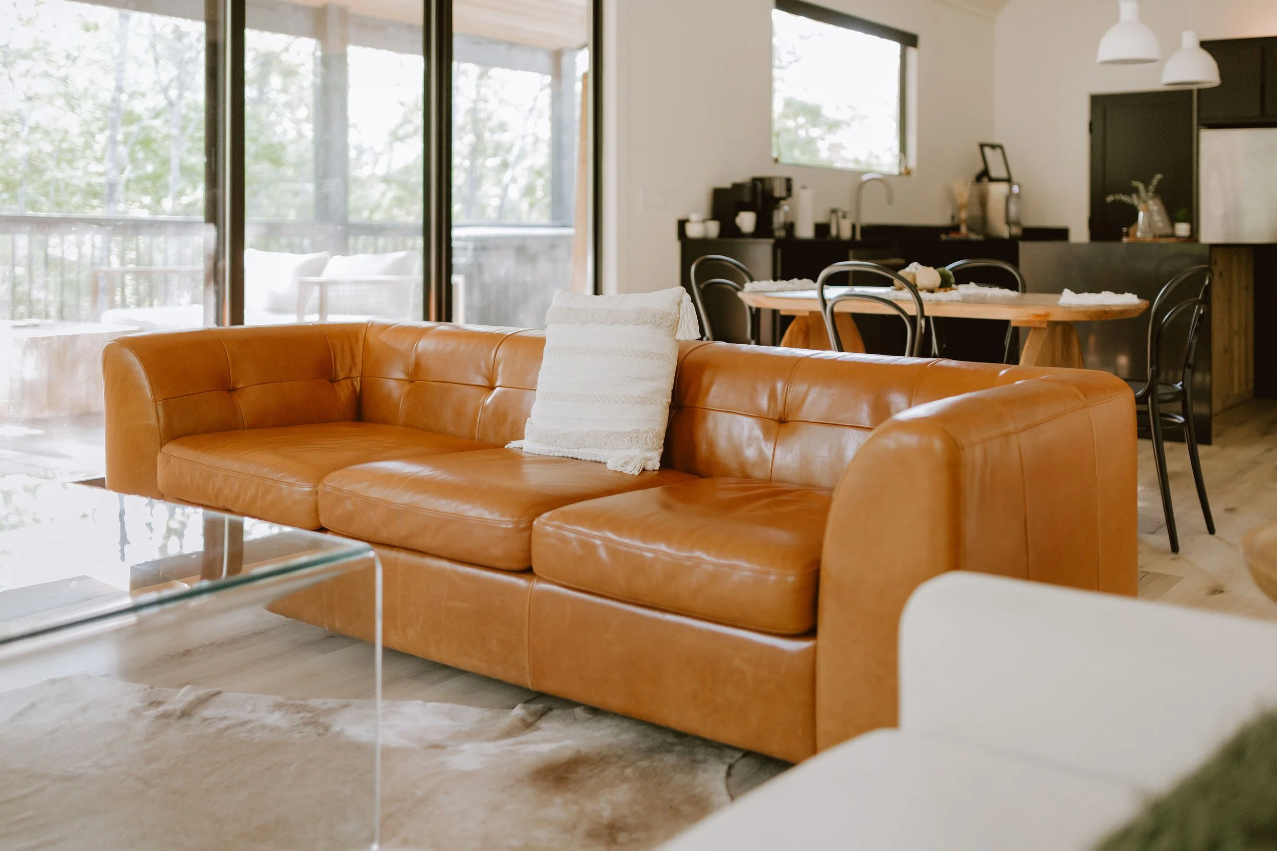 Living room at Hygge Hill, a modern cabin, in Broken Bow/Hochatown, OK.