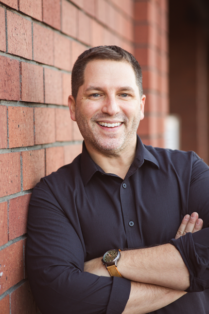Professional headshot of Joshua Miller, executive coach and founder of The Human Intelligence Advantage™, representing modern leadership in the age of AI