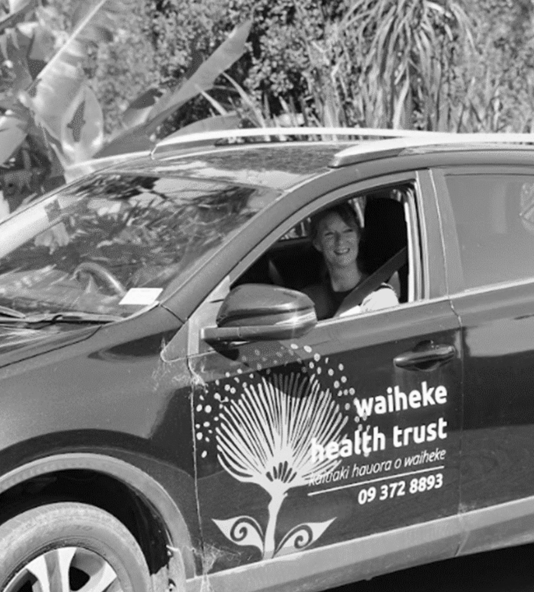 An image of the Waiheke Health Trust car and a friendly community nurse
