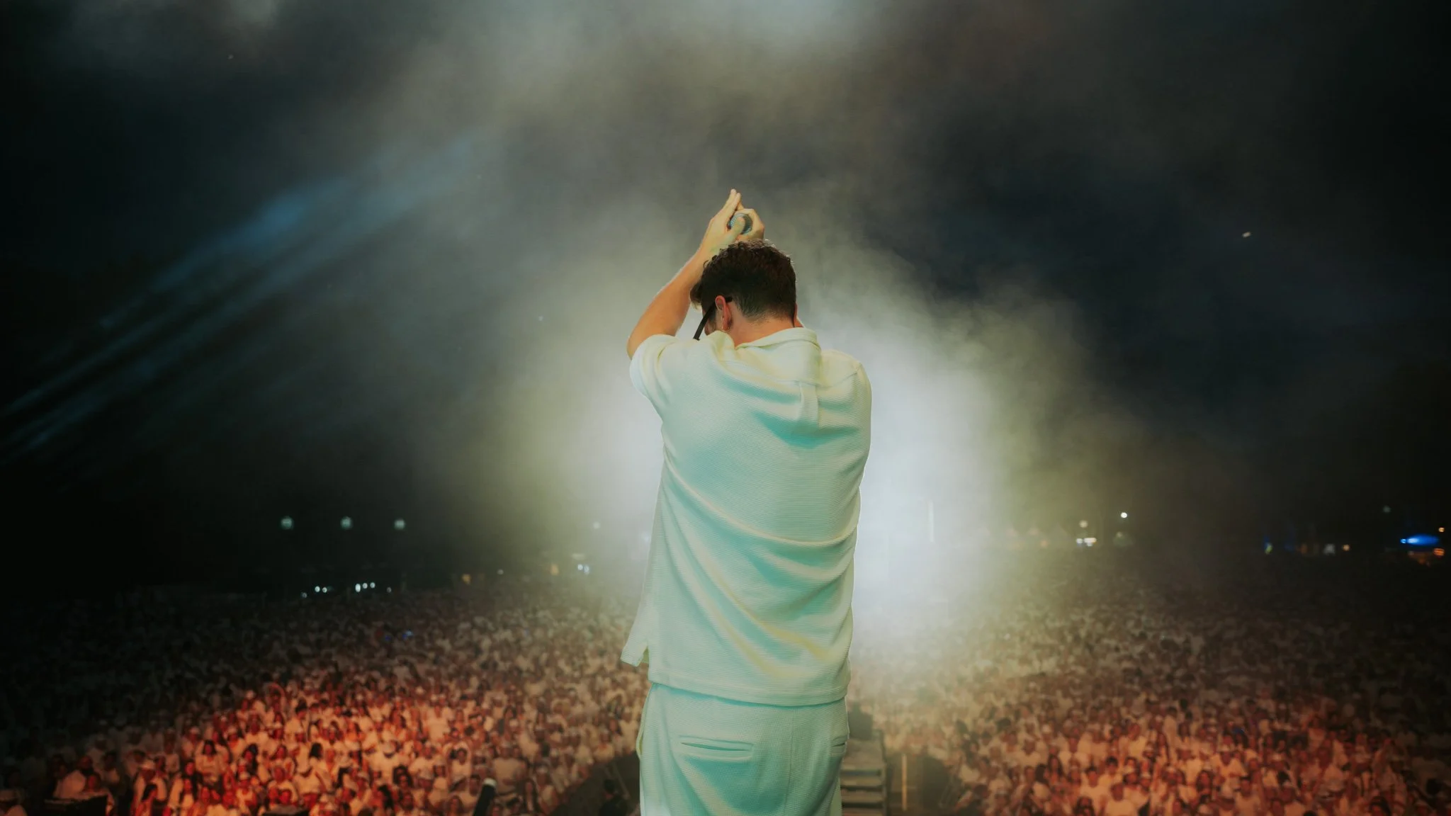 Professional festival photography created for artist branding, press use, and event marketing featuring YouNotUs live on stage.