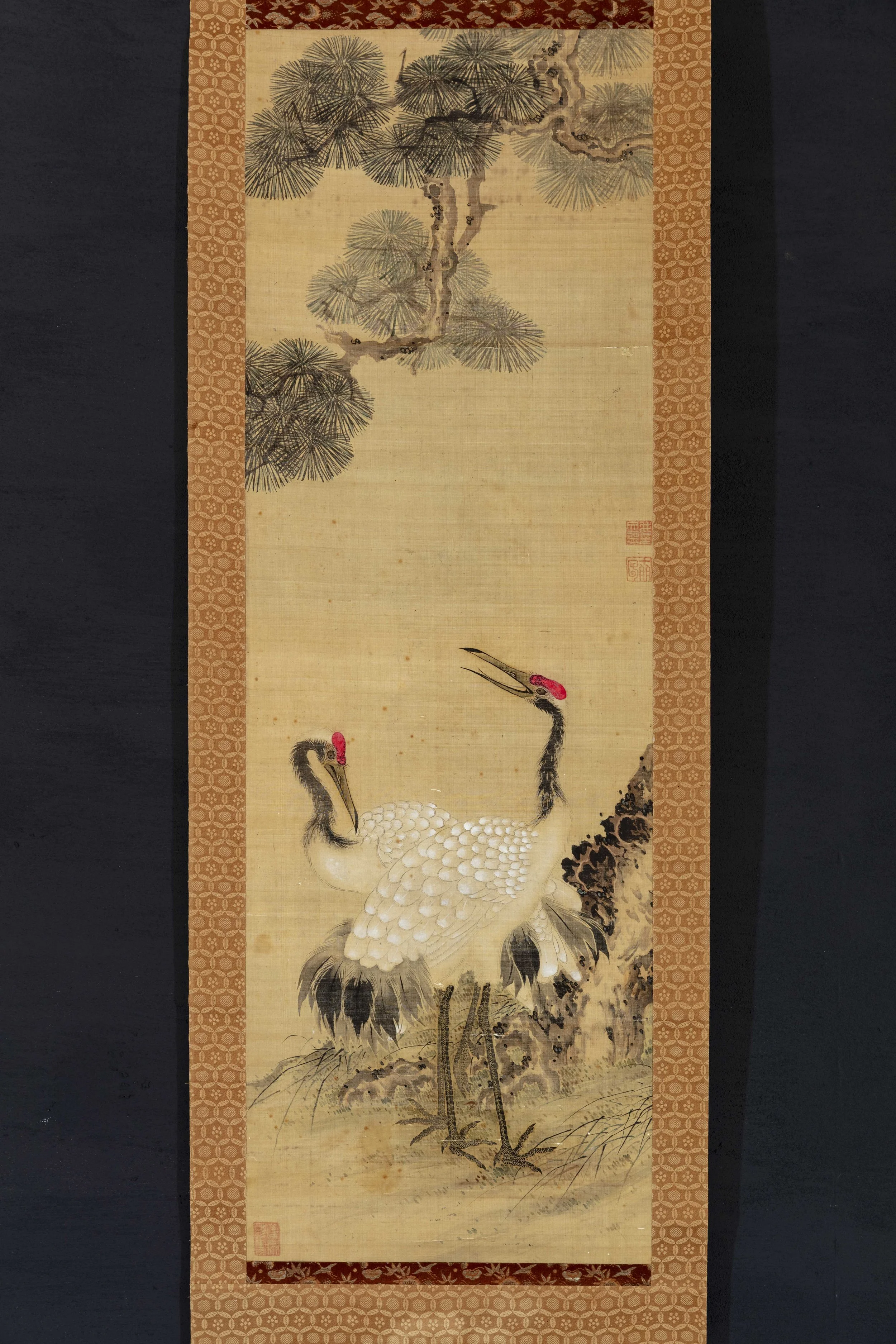 Twin Cranes Beneath a Pine