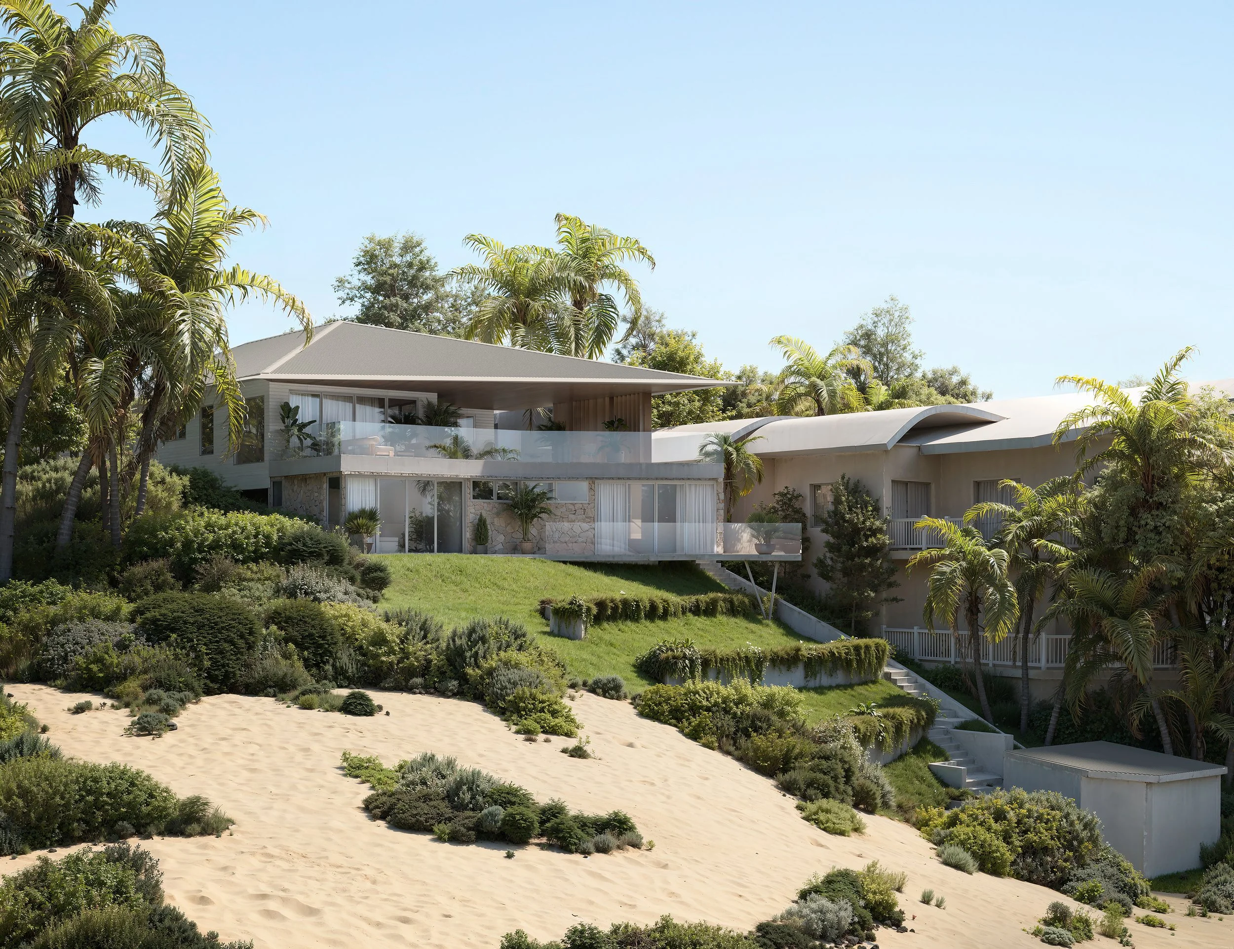 A modern house with large glass windows and a spacious balcony, surrounded by lush greenery and palm trees, with a sandy beach in the foreground and a clear blue sky in the background.