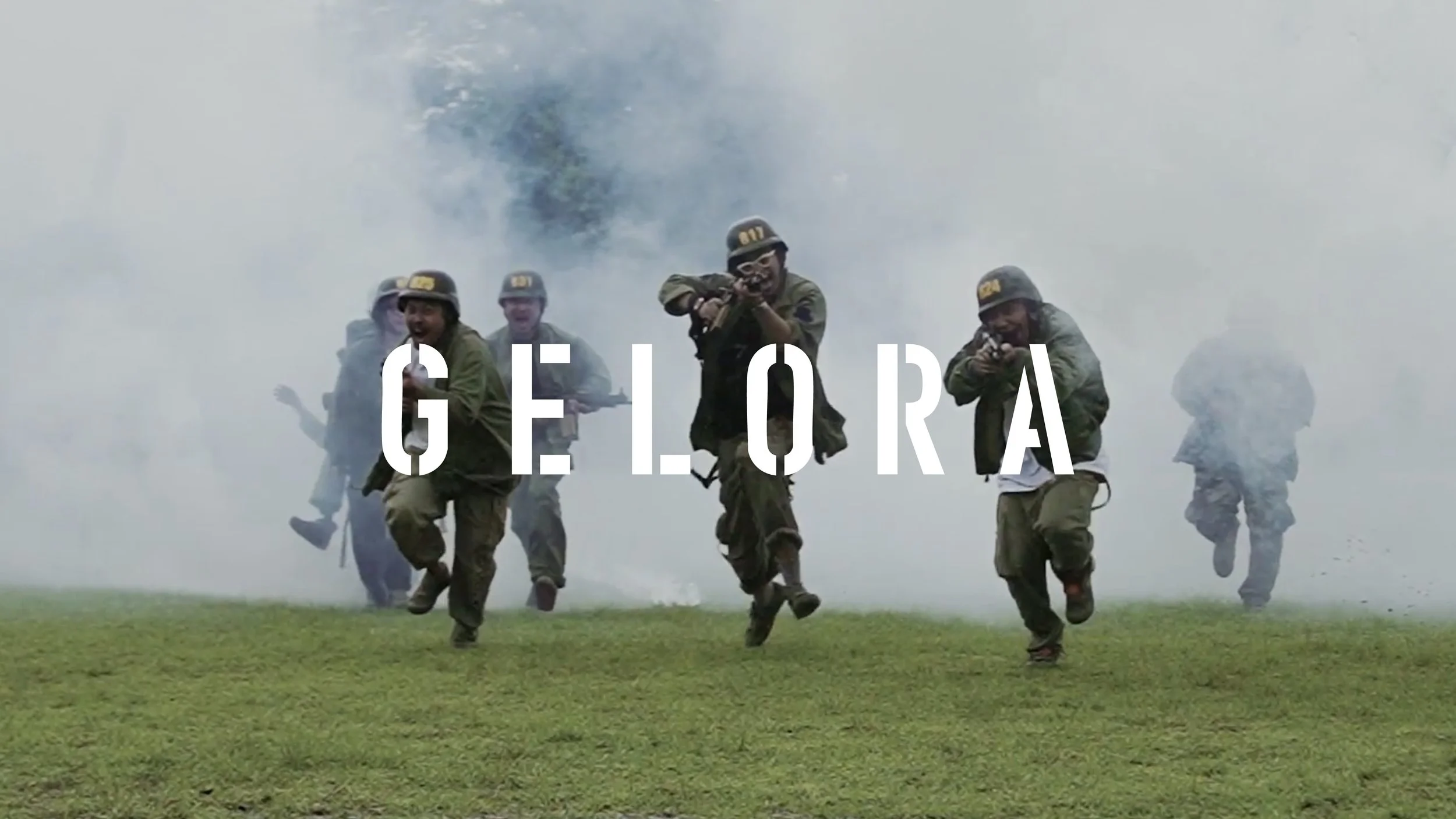 Soldiers in uniform and helmets running through smoke with the word 'GELORA' overlaid.