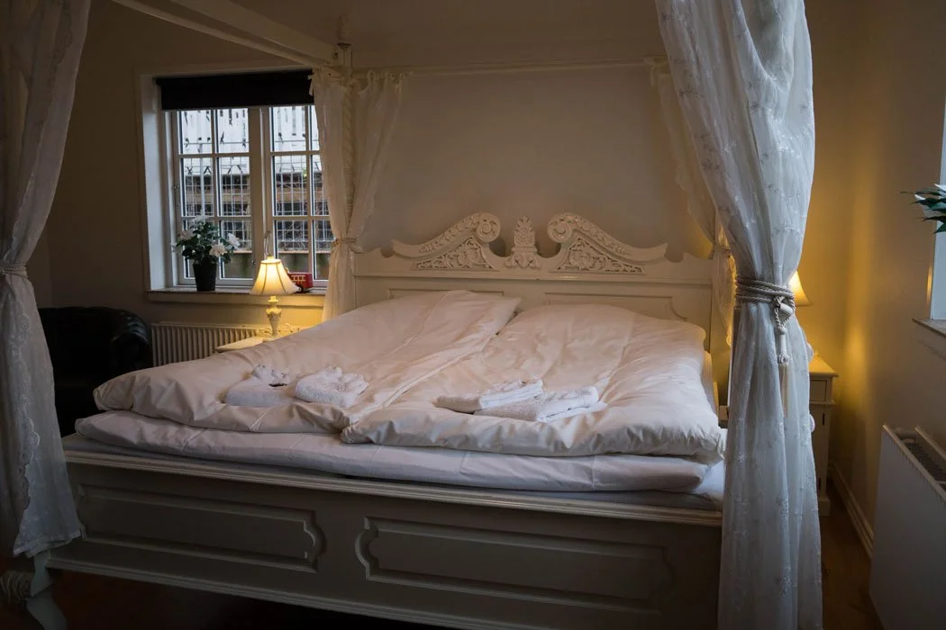 Brandmesterens Vagtstue himmelseng familielejlighed Boutique Hotel Postgården