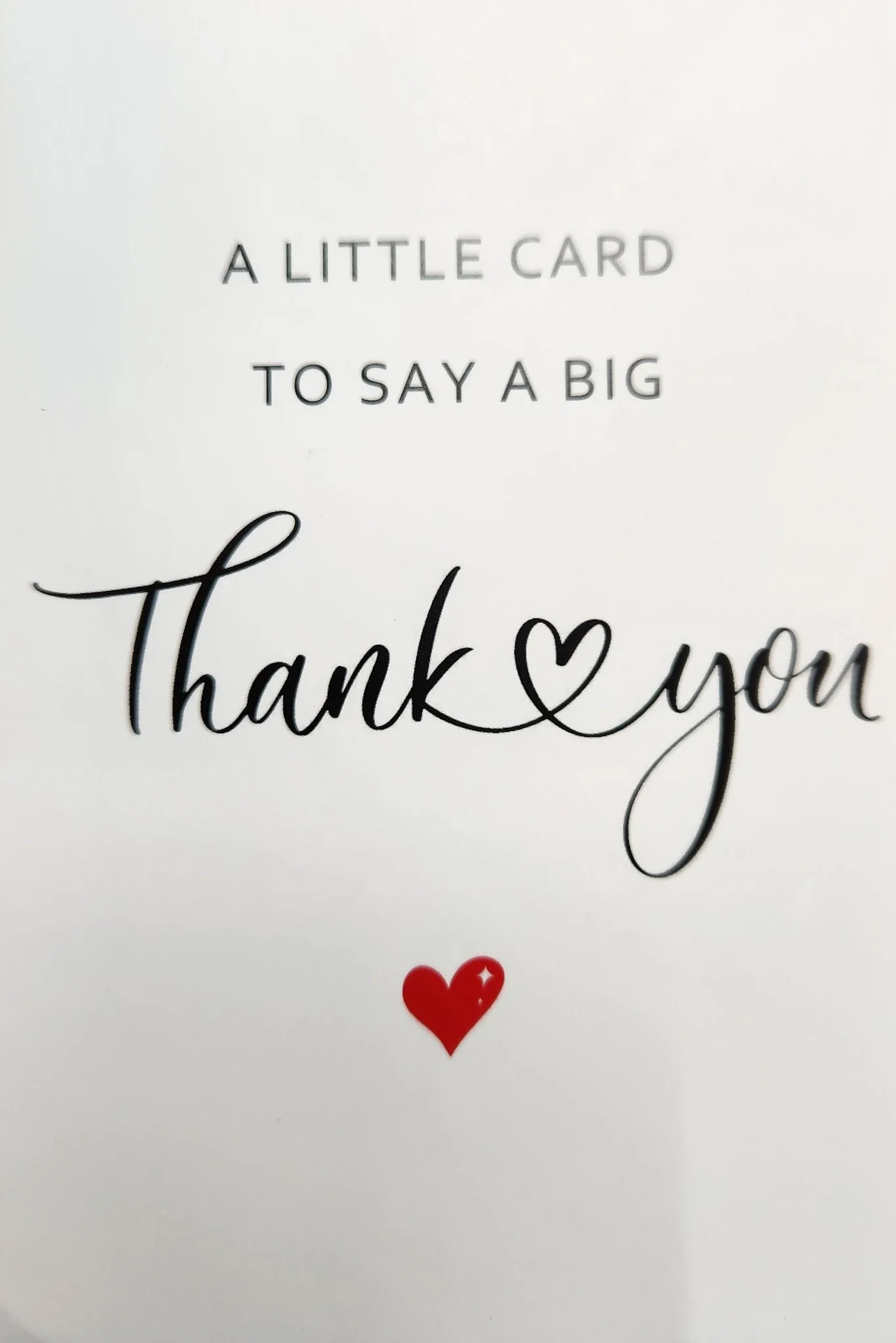 A white card with black and gray text that reads, 'A little card to say a big thank you,' to Ardent Fireworks Ltd