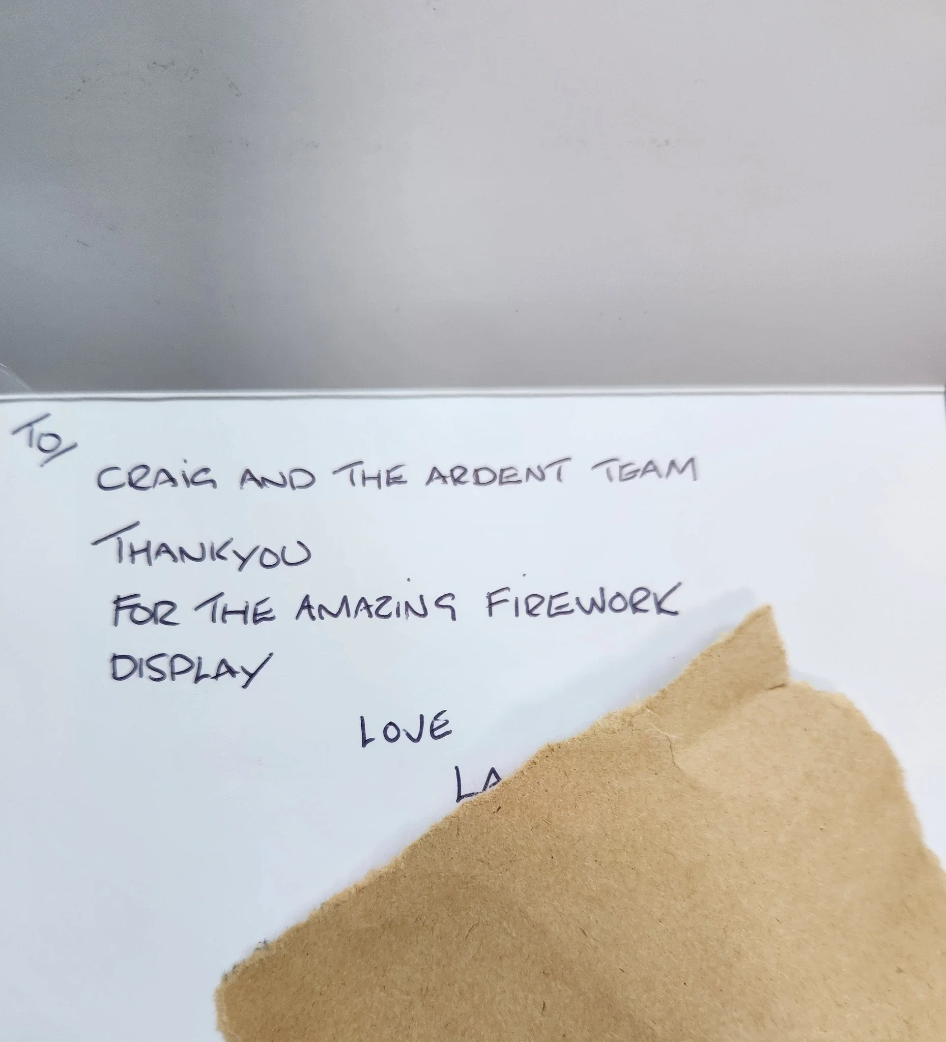 Handwritten thank you note "To Craig and the Ardent Team, Thank you for the amazing fireworks display."