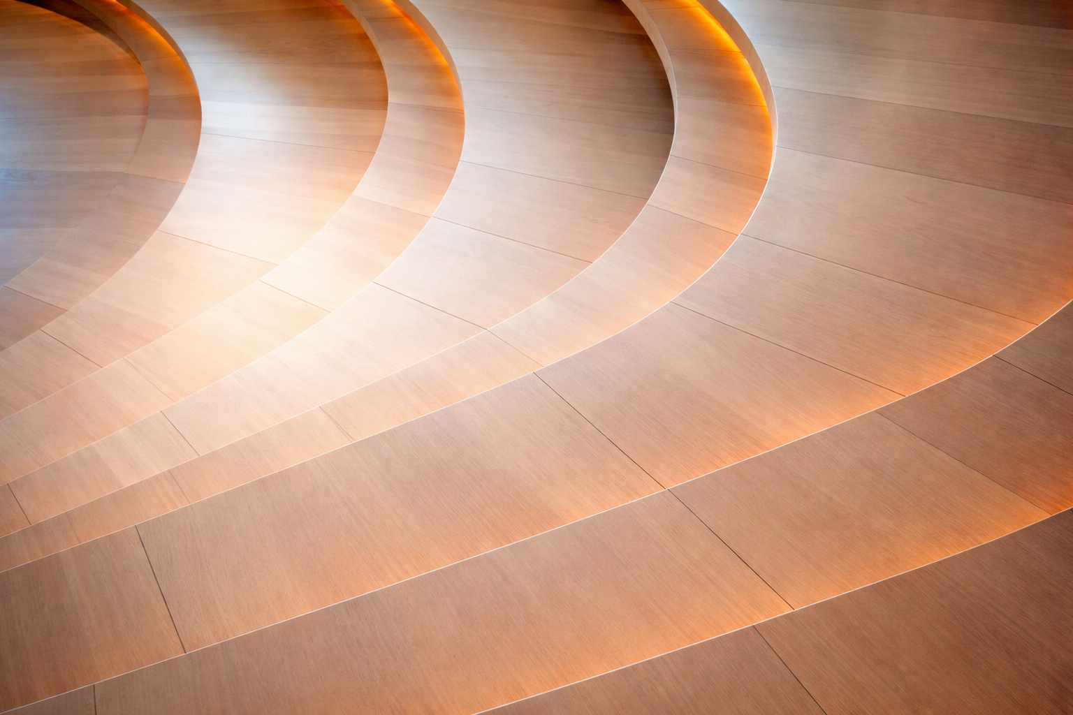 Multiple wooden curved panels with embedded lighting, creating an architectural design feature.