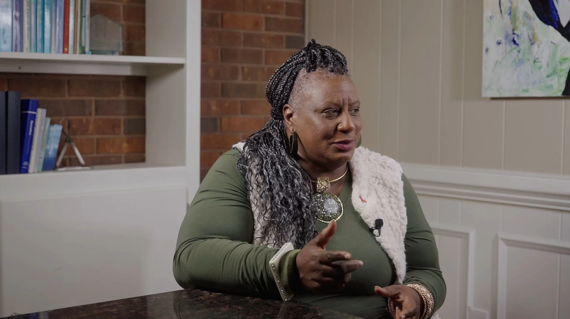 Black female client speaking on her experience