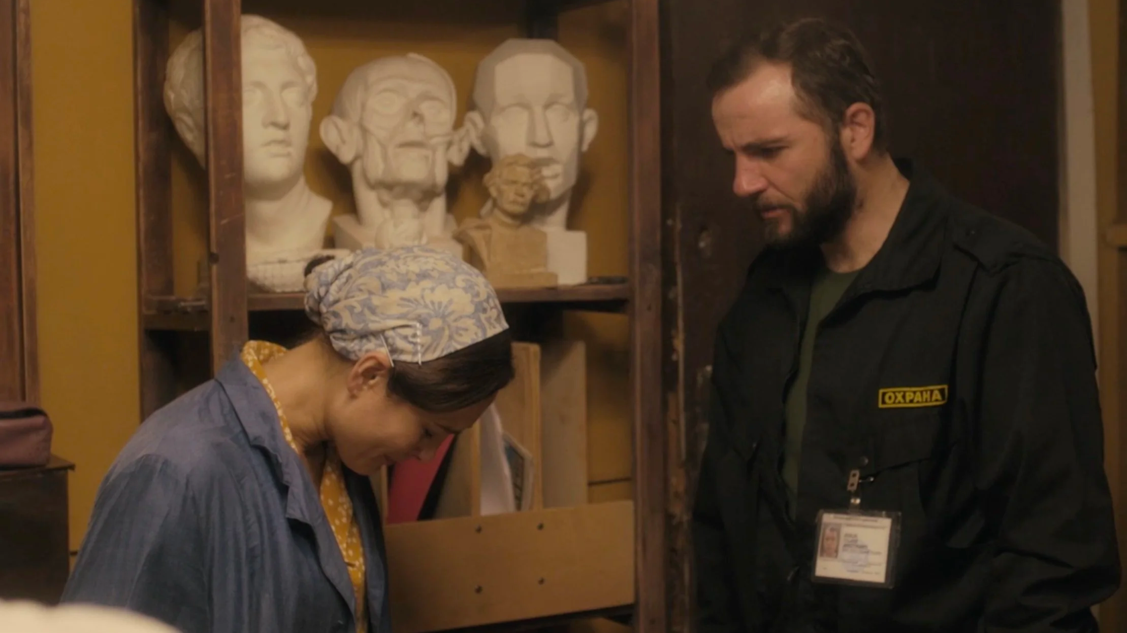 Film still from "Gucci", a short film presented by Proteus Pictures, capturing an intimate moment between the protagonists.