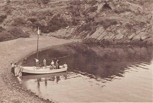 Vintage photo of Bellamar boat on shore in Cap de Creus. 
