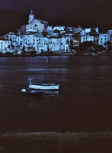 Archive photo of Bellamar at night, showcasing nearly a century of authentic sailing tradition in Spain.