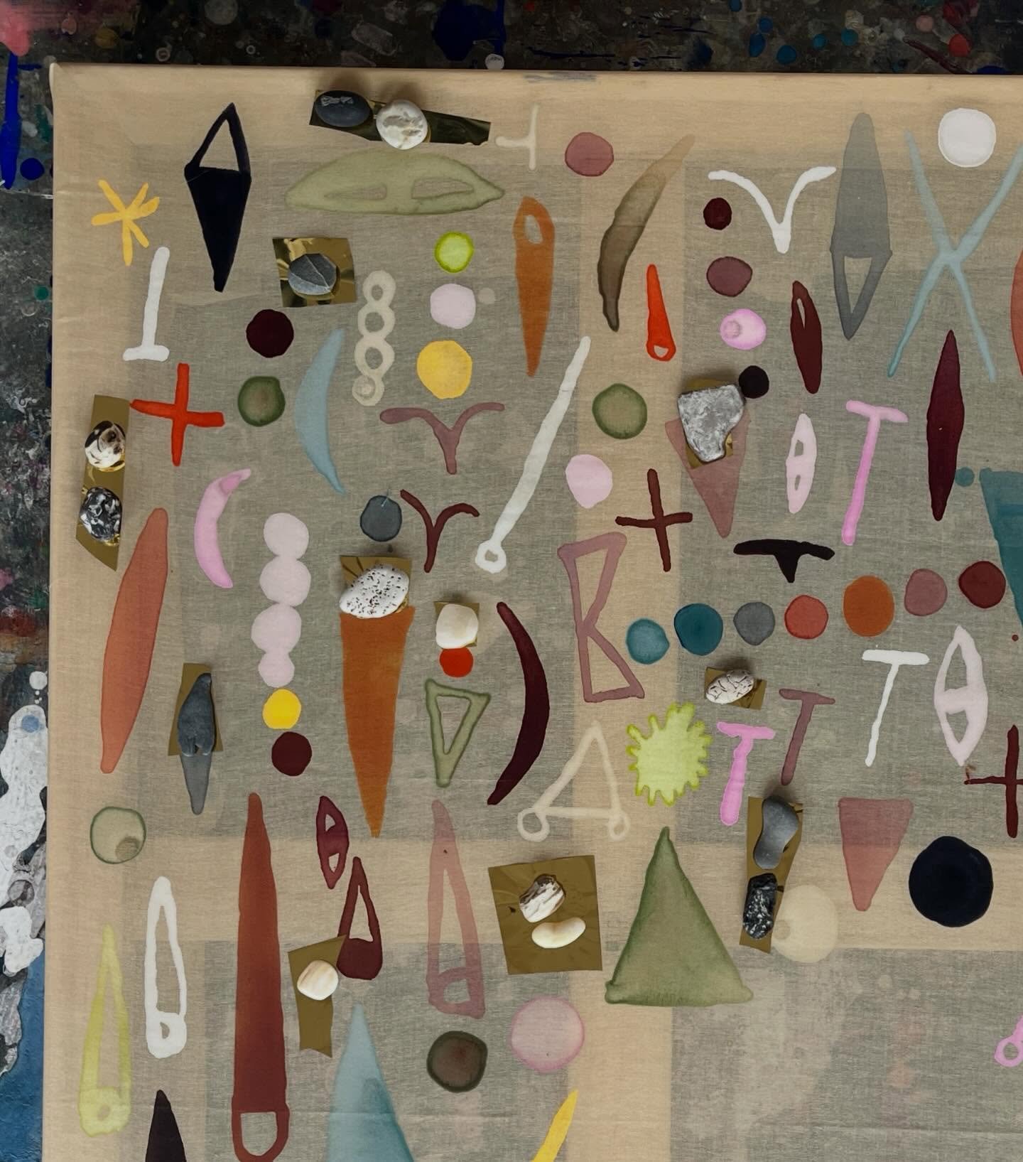 Gold foil and paint on organdie - next step the stitches.