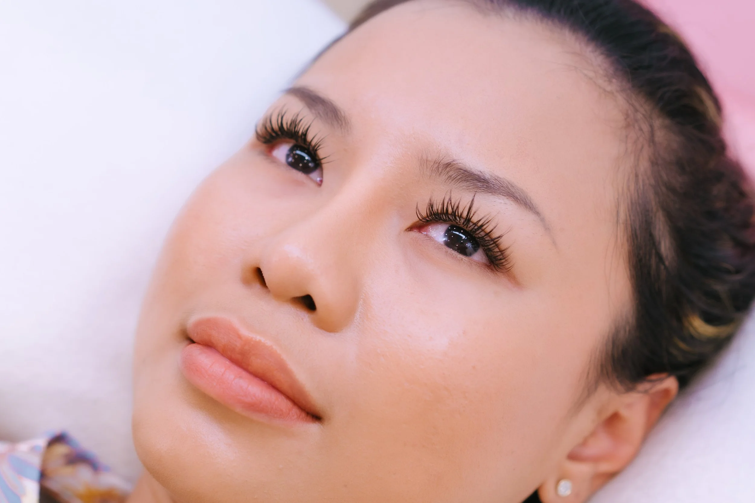 Close-up of wispy mascara eyelash extensions by Bangkok Lash