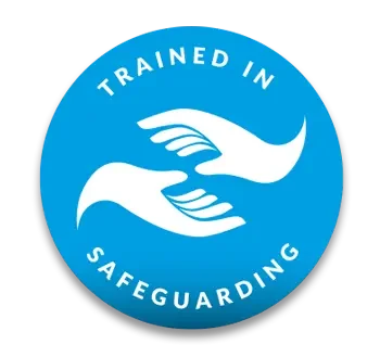 Blue circular badge with two white stylized hands and the text "Trained in Safeguarding"