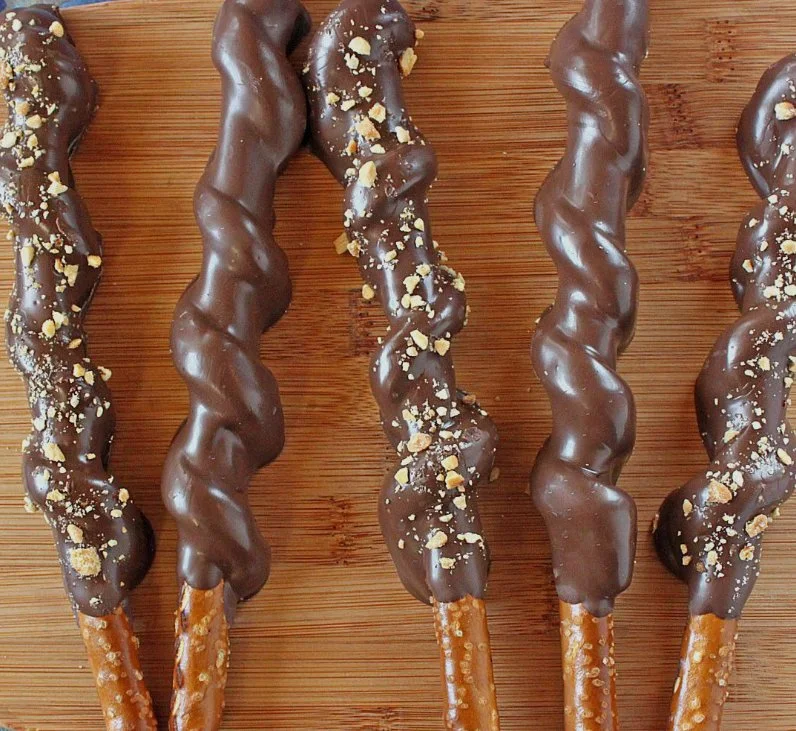 (1/2) Dozen Pretzel rods w/ caramel wrapped & Dipped in chocolate