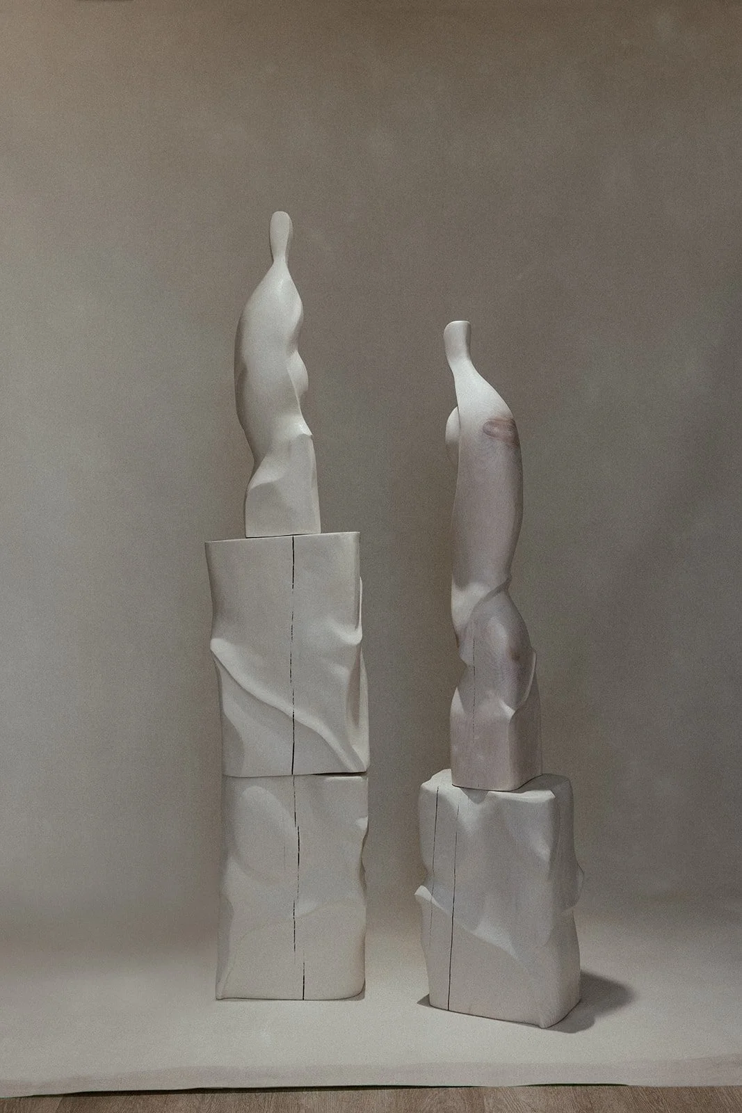 Sexy Af_Petula and Parker sculptures stacked on pedestals.jpg