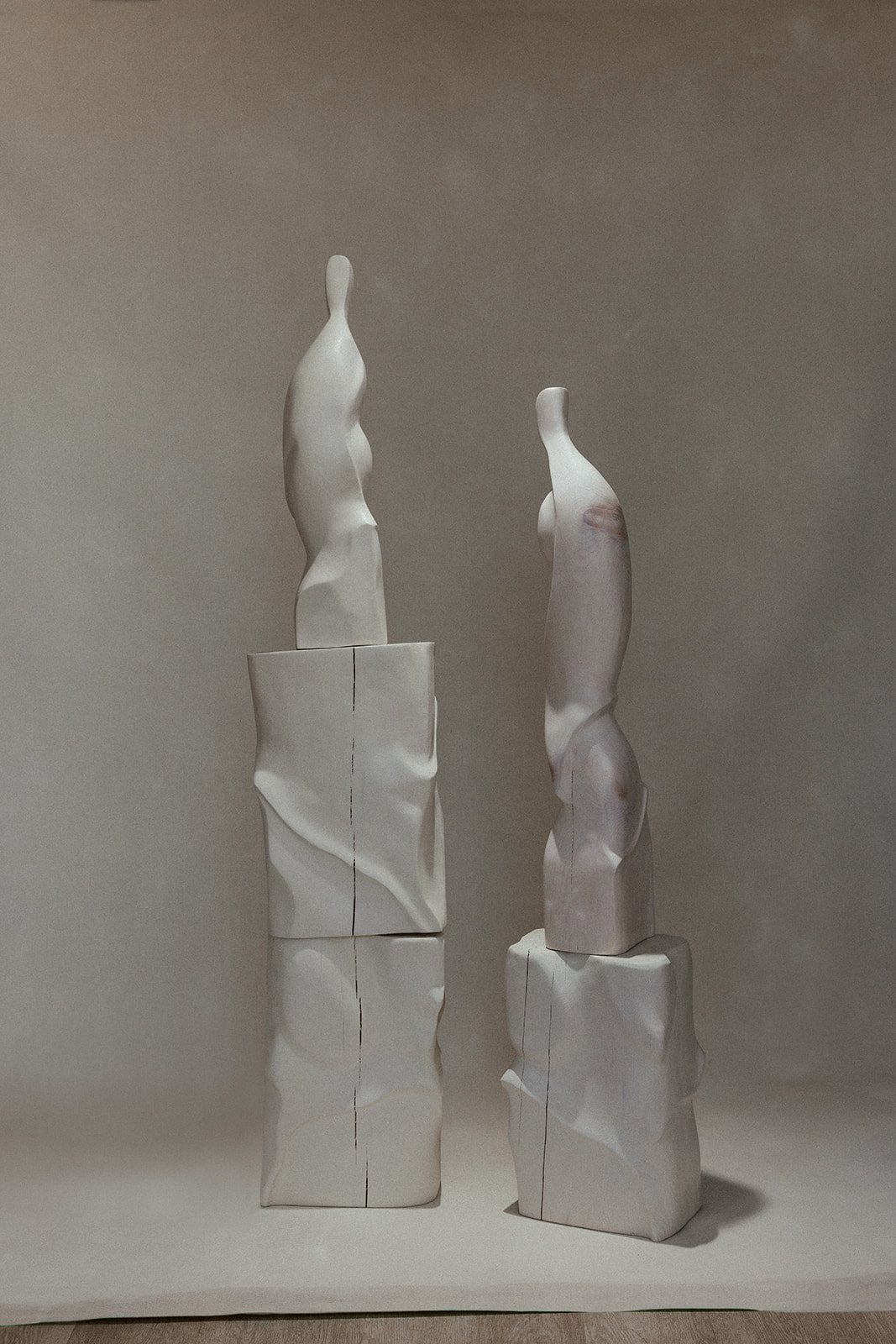 Sexy Af_Petula and Parker sculptures stacked on pedestals.jpg