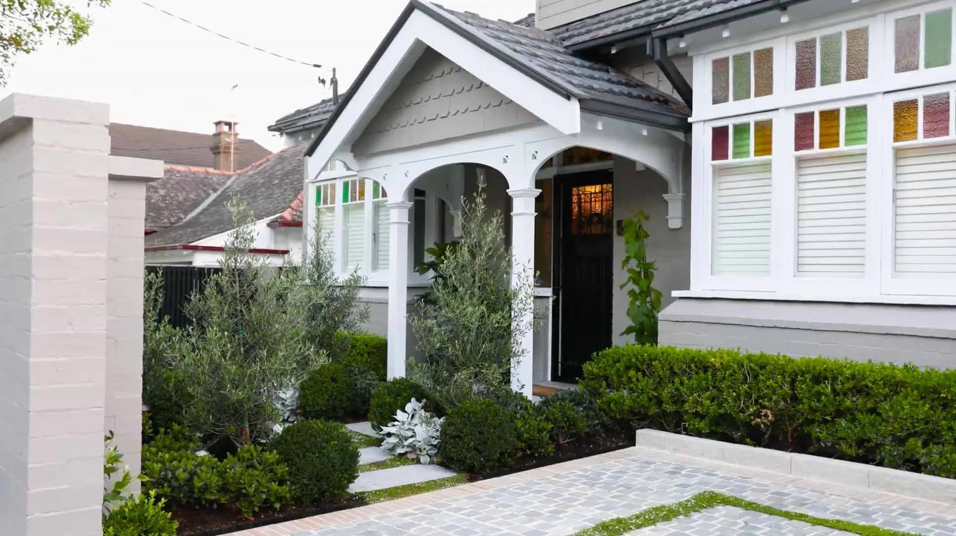 Classic style home with elegant garden and driveway