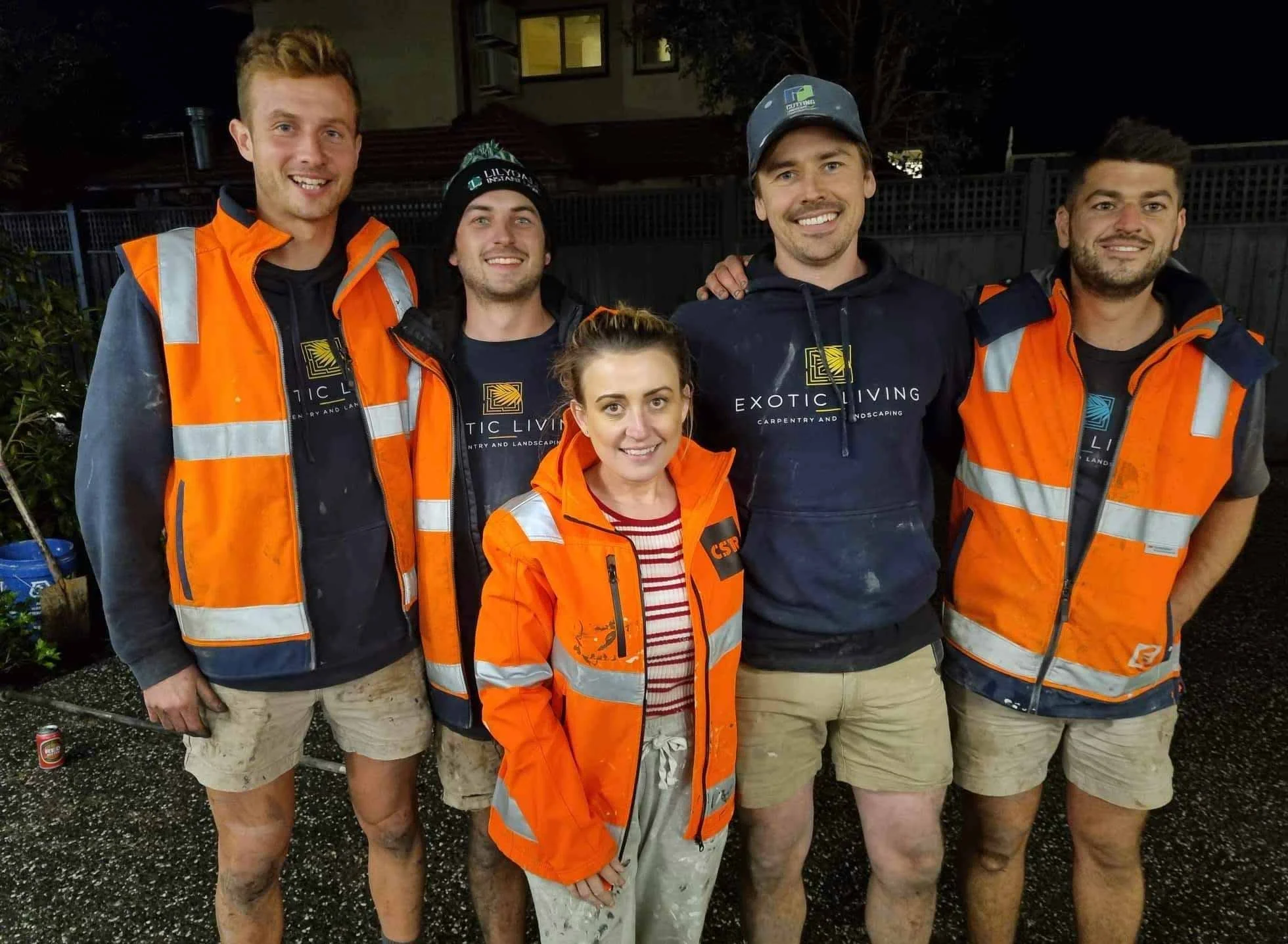 The Block 2021, Exotic Living. Group shot of the two contestants, Kirsty and Jesse, with three Exotic Living tradesmen.