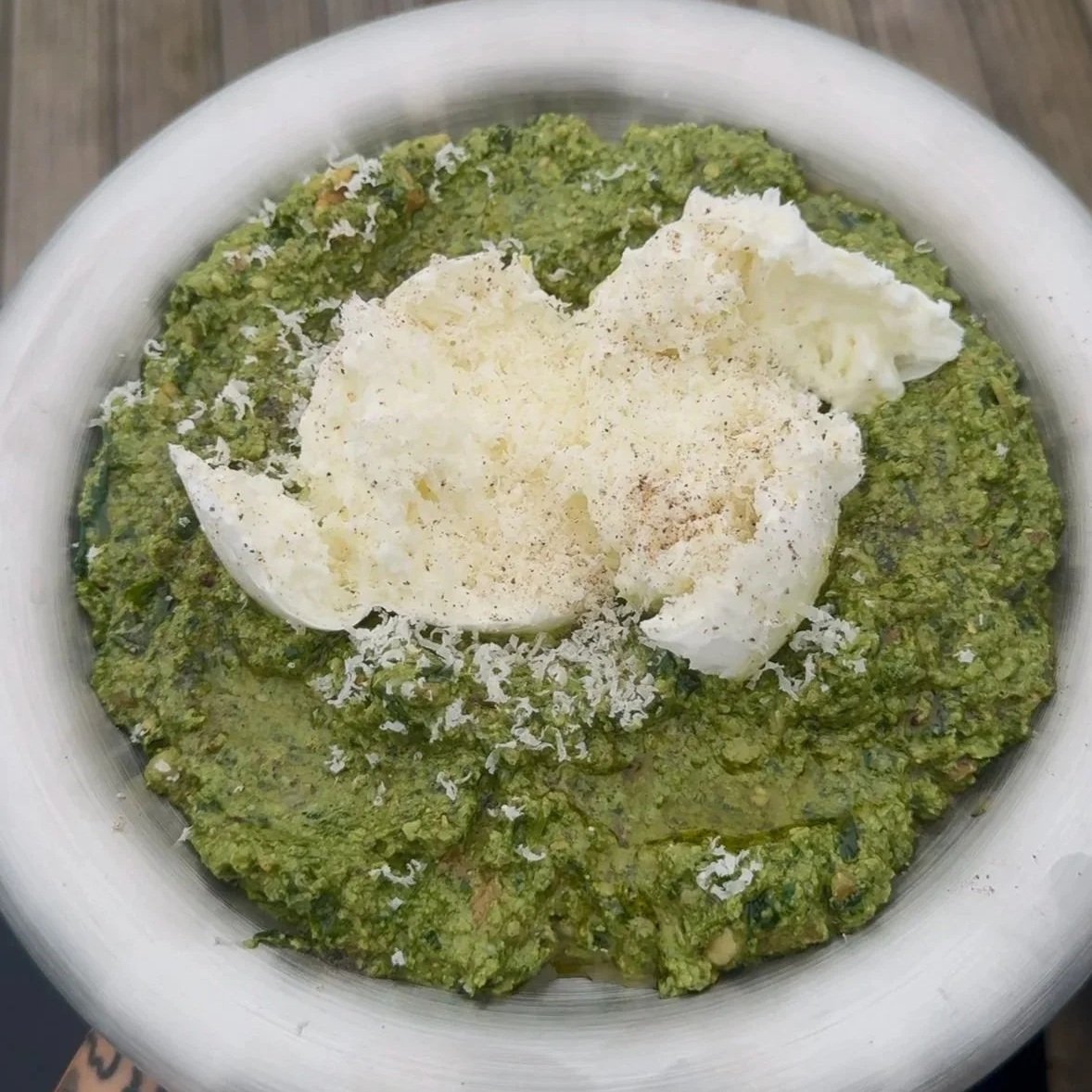 Super Seed green Pesto on plate with Basil Spinach and Seeds