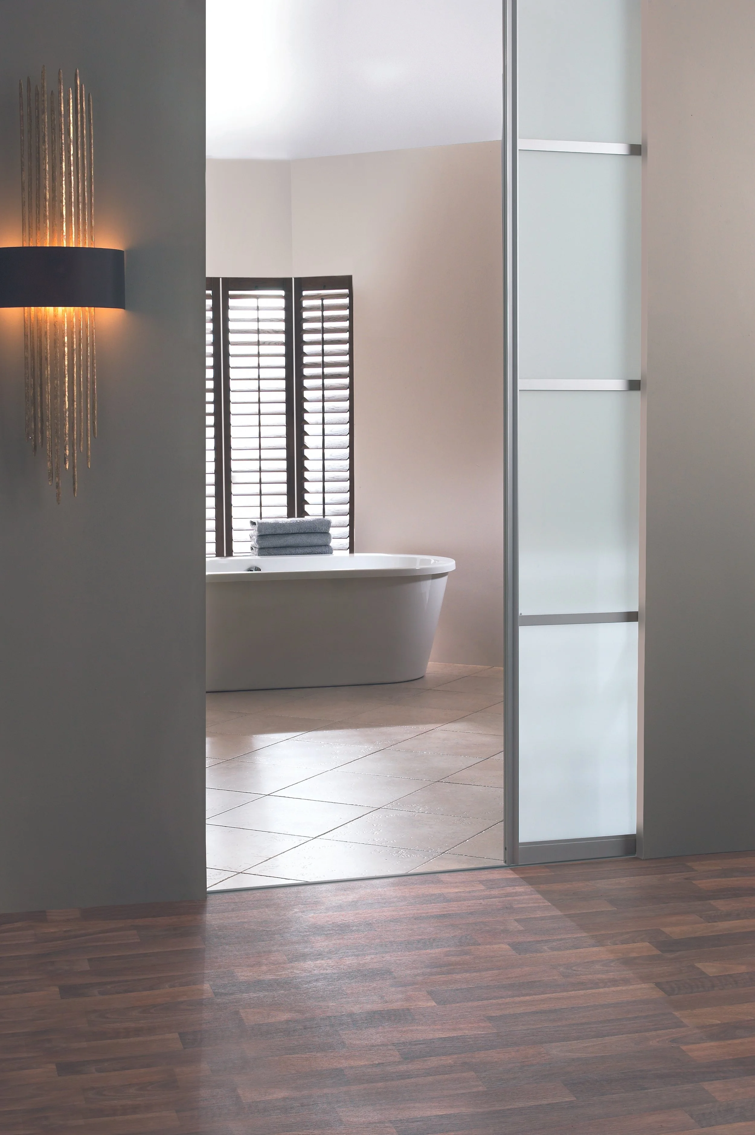 Single Aluminium SLiding Door between Bedroom and Bathroom with tranlucent glass and horizontal midrails 