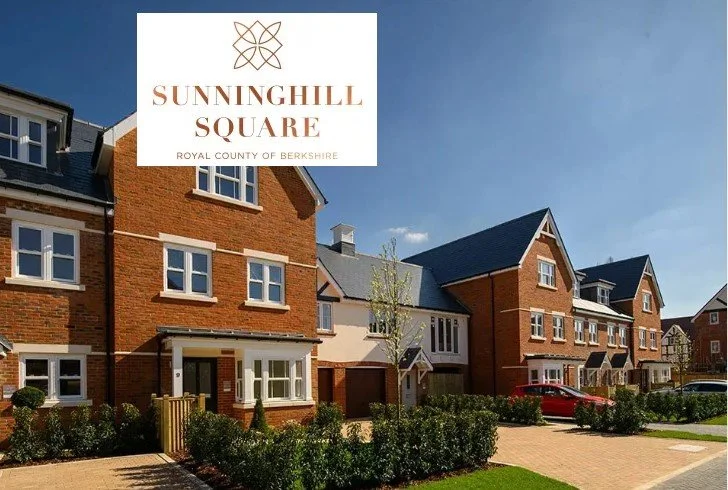 Exterior view of a residential neighborhood called Sunninghill Square in Royal County of Berkshire, showing modern brick houses with well-maintained gardens and parked cars under a clear blue sky.