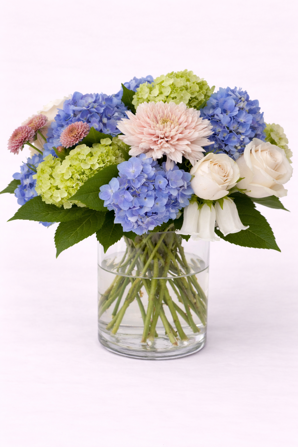 Pastel floral bouquet in vase.png