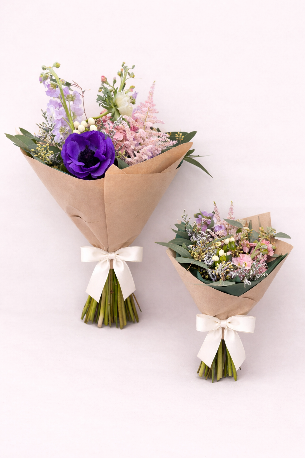Delicate floral bouquets in kraft paper.png