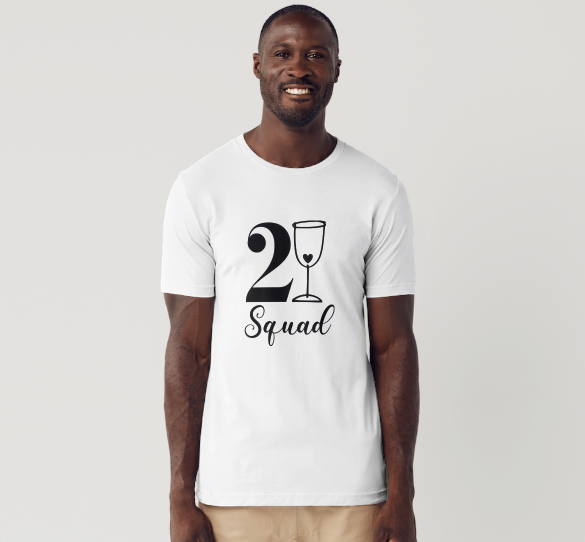 21st birthday celebration photo featuring friends in matching “21 Squad” T‑shirts, holding rosé on a rooftop at sunset.