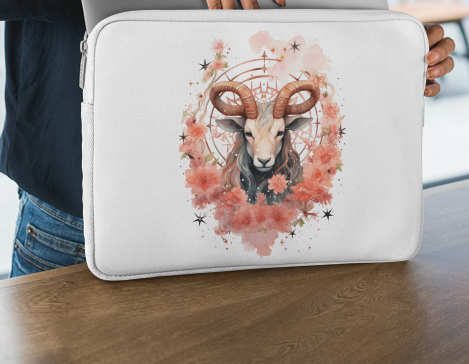 Laptop sleeve featuring an artistic Capricorn illustration with earthy tones and floral accents.