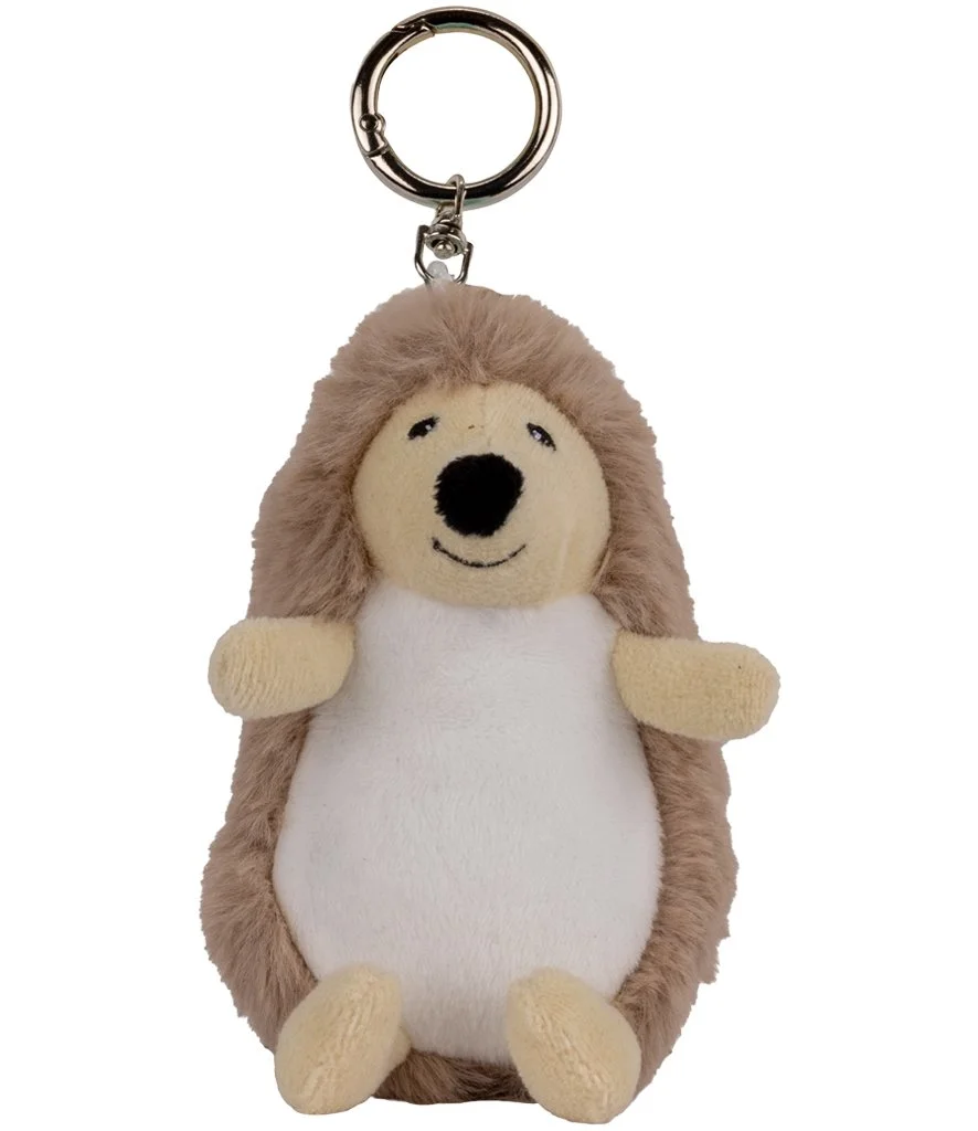 A soft brown hedgehog plush with a white belly, fluffy textured back and embroidered facial features.