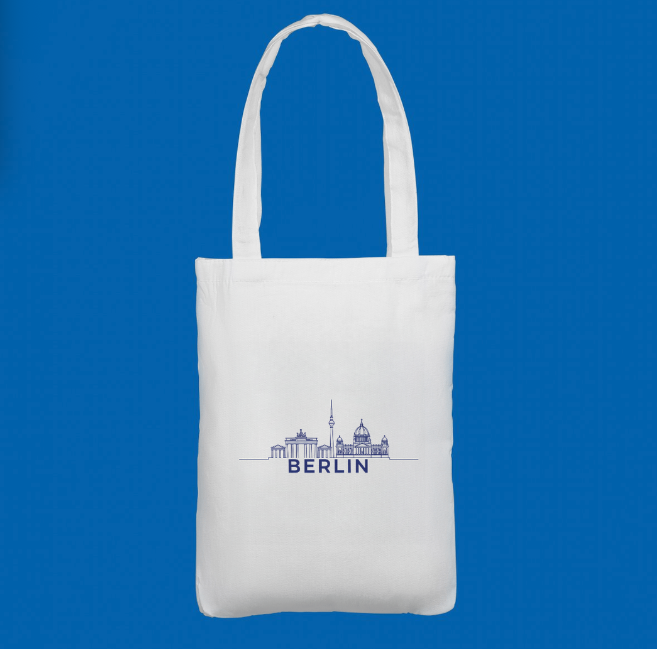 A stylish white tote bag printed with a blue line‑art skyline of Berlin’s iconic architecture. A perfect everyday accessory or travel keepsake.