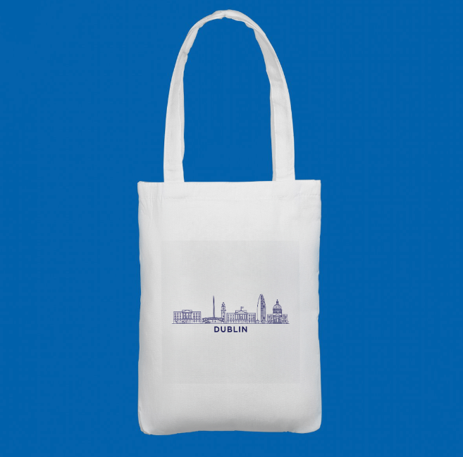 A white tote bag printed with a blue minimalist skyline of Dublin’s landmarks. A perfect gift for Ireland lovers and travellers.