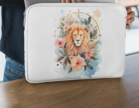 Laptop sleeve featuring an artistic Leo illustration with radiant hair and floral accents.