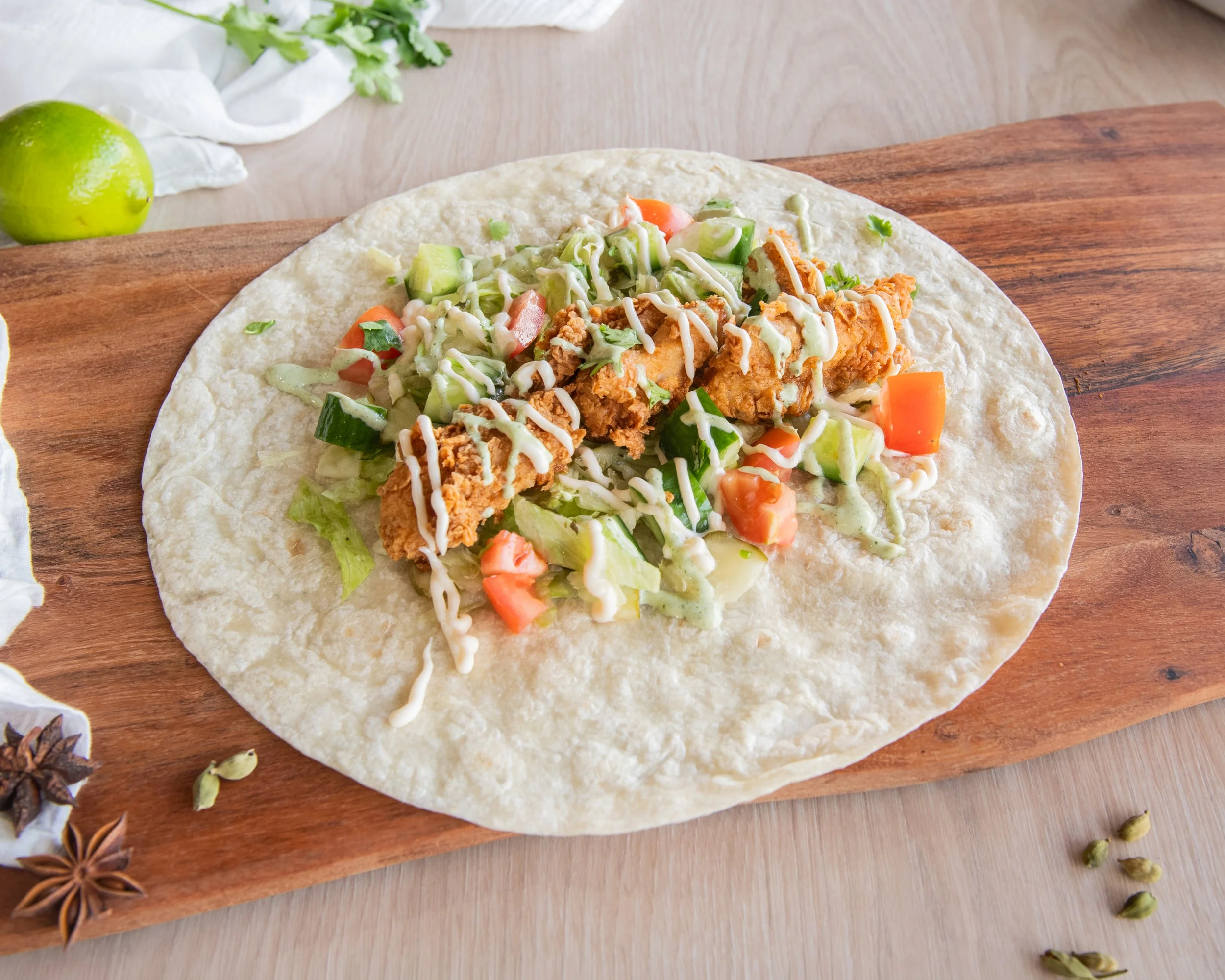 Authentic Bangladeshi burritos packed with bold spices, tender protein, seasoned rice, fresh salad, and house-made sauces, all wrapped in a soft tortilla. Inspired by traditional Bangladeshi street food flavours, these fusion burritos deliver a perfe