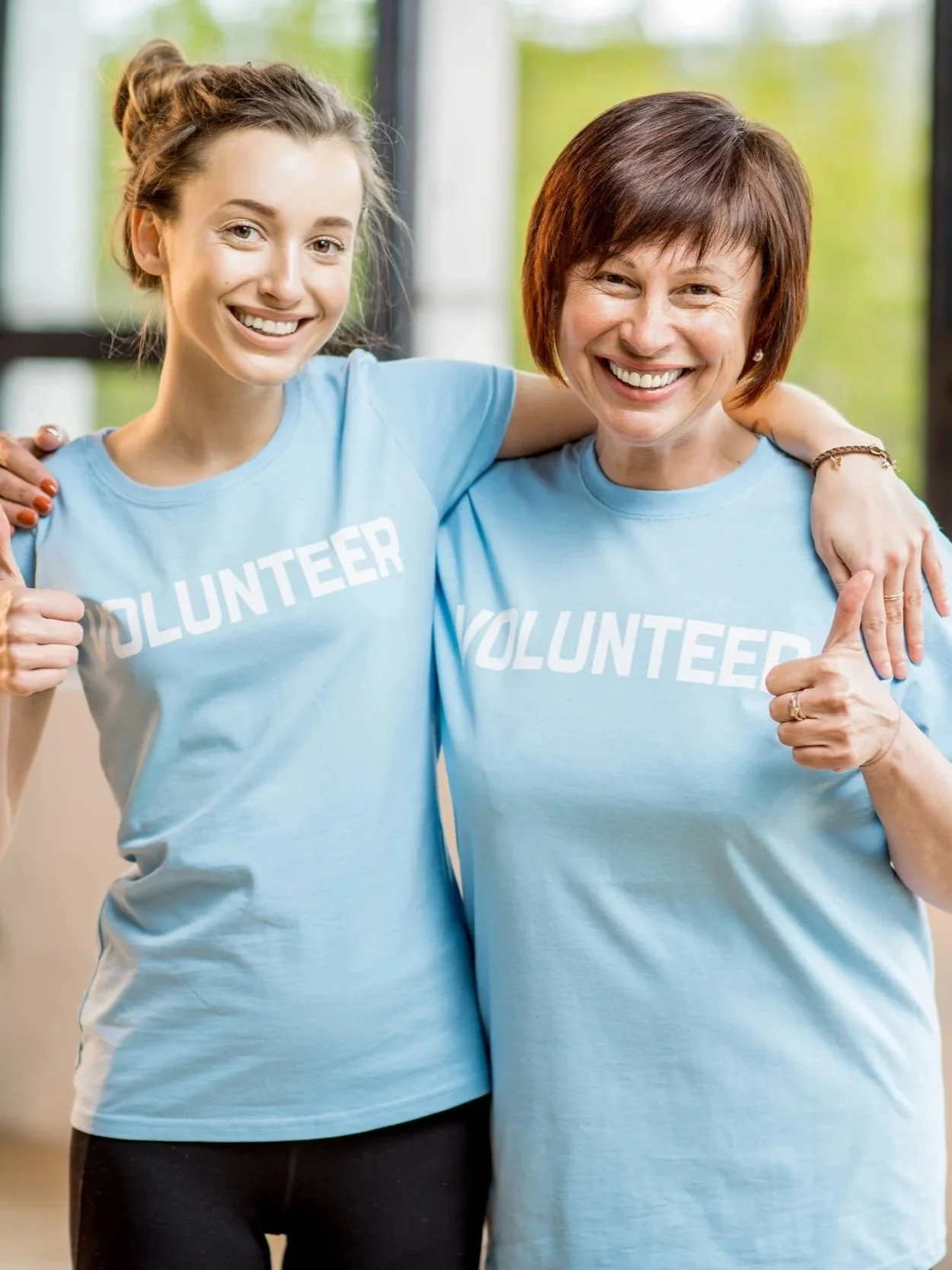Swan Cares Team members volunteering at a local food pantry.