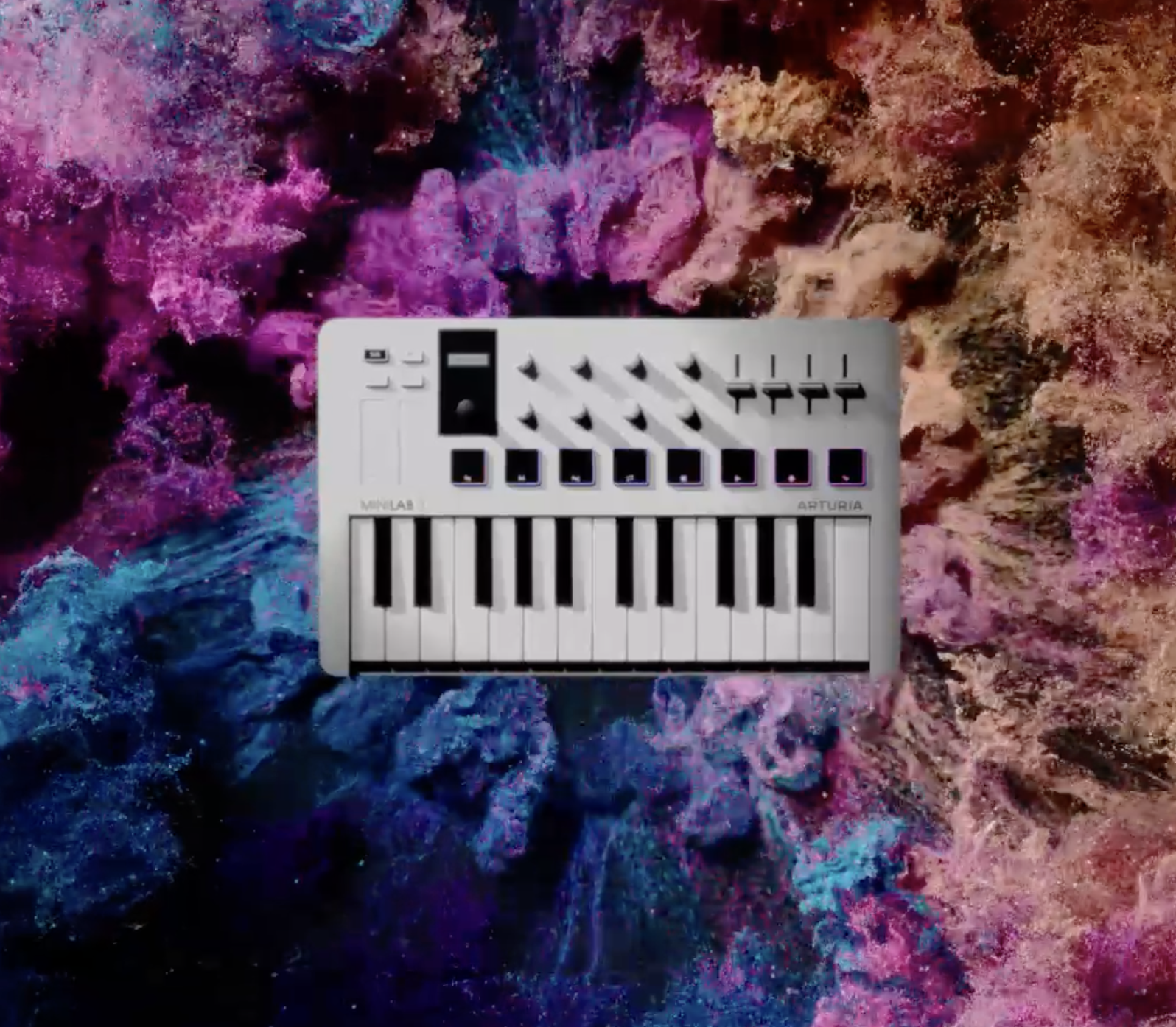 A compact MIDI keyboard synthesizer with black and white keys resting on a colorful, abstract background with pink, purple, blue, and brown hues.