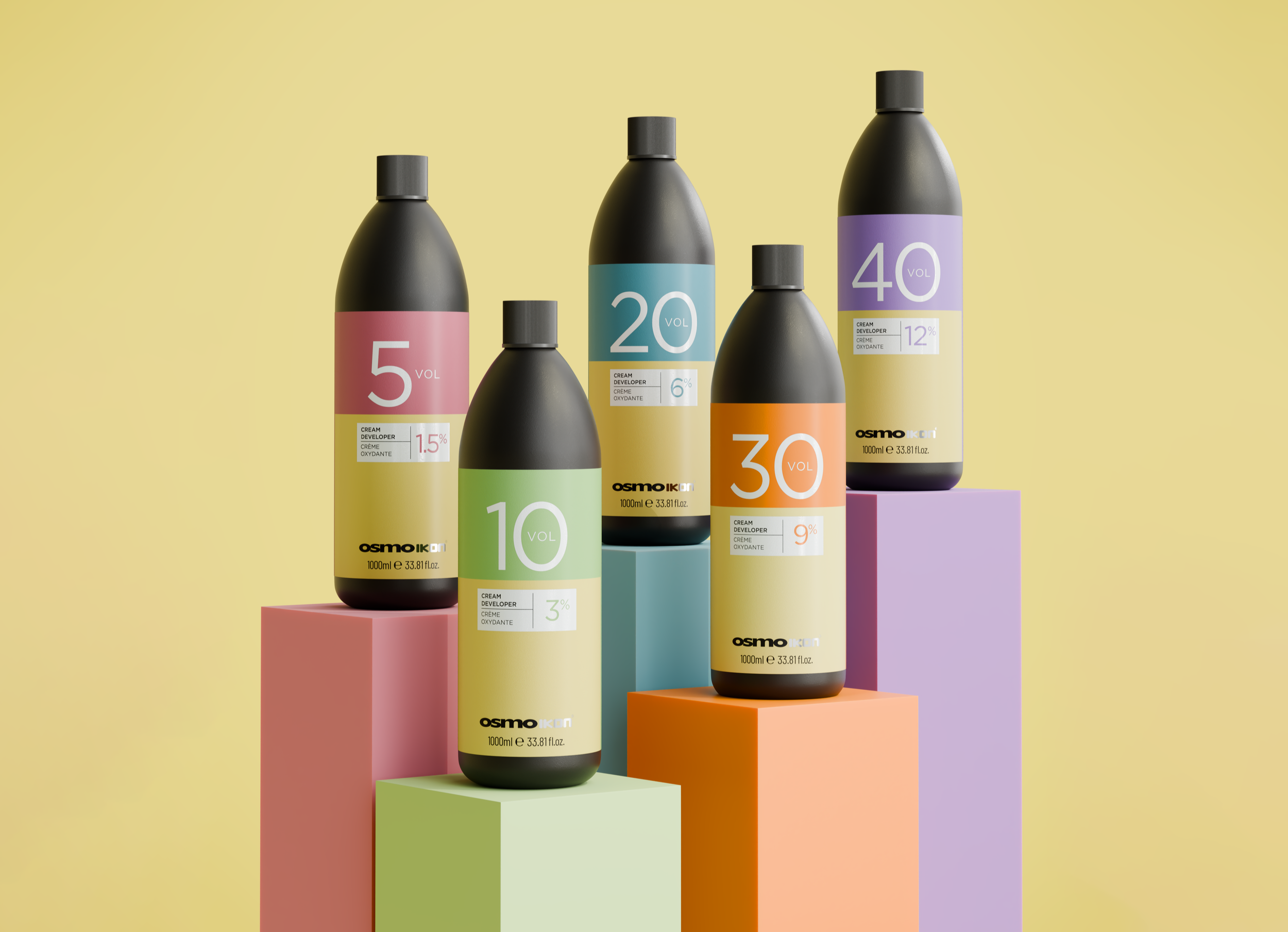 OSMO IKON developer colourful bottles labelled with different volume percentages, arranged on colored pedestals against a yellow background.