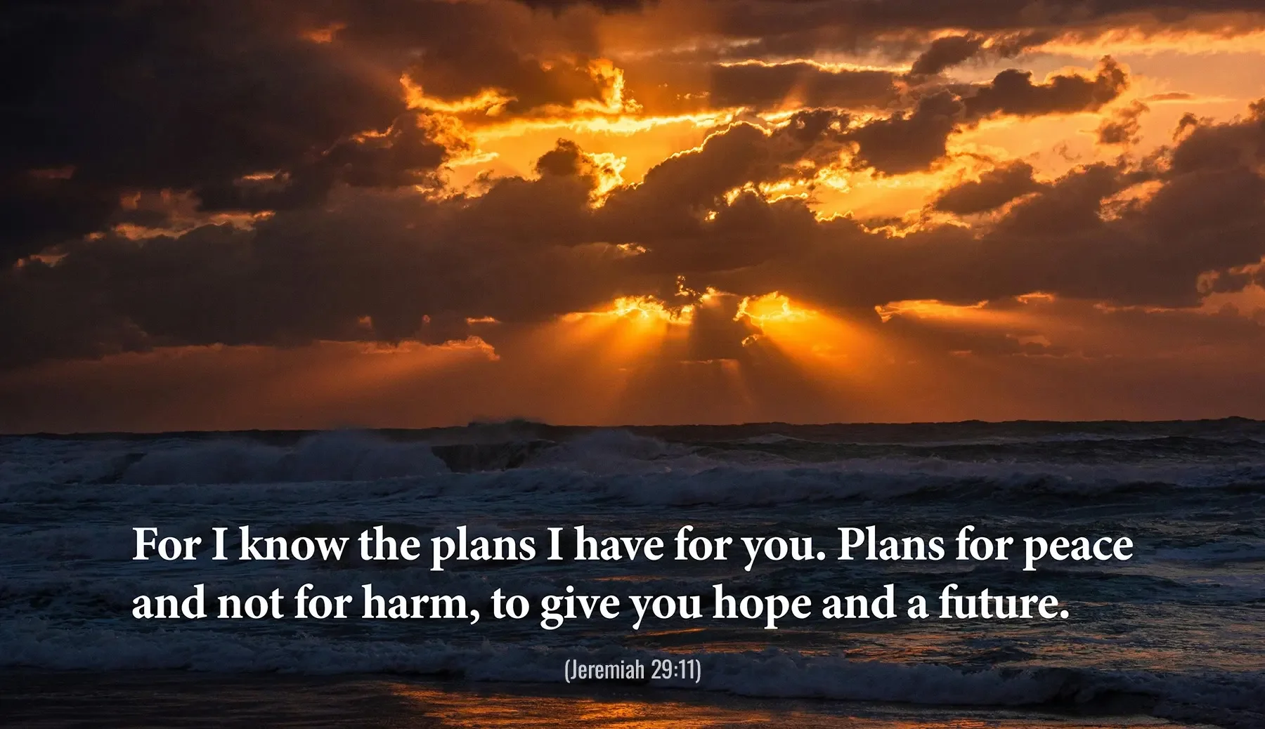 Jeremiah 29:11 Bible verse with dramatic sun rays breaking through clouds, symbolizing hope and peace.