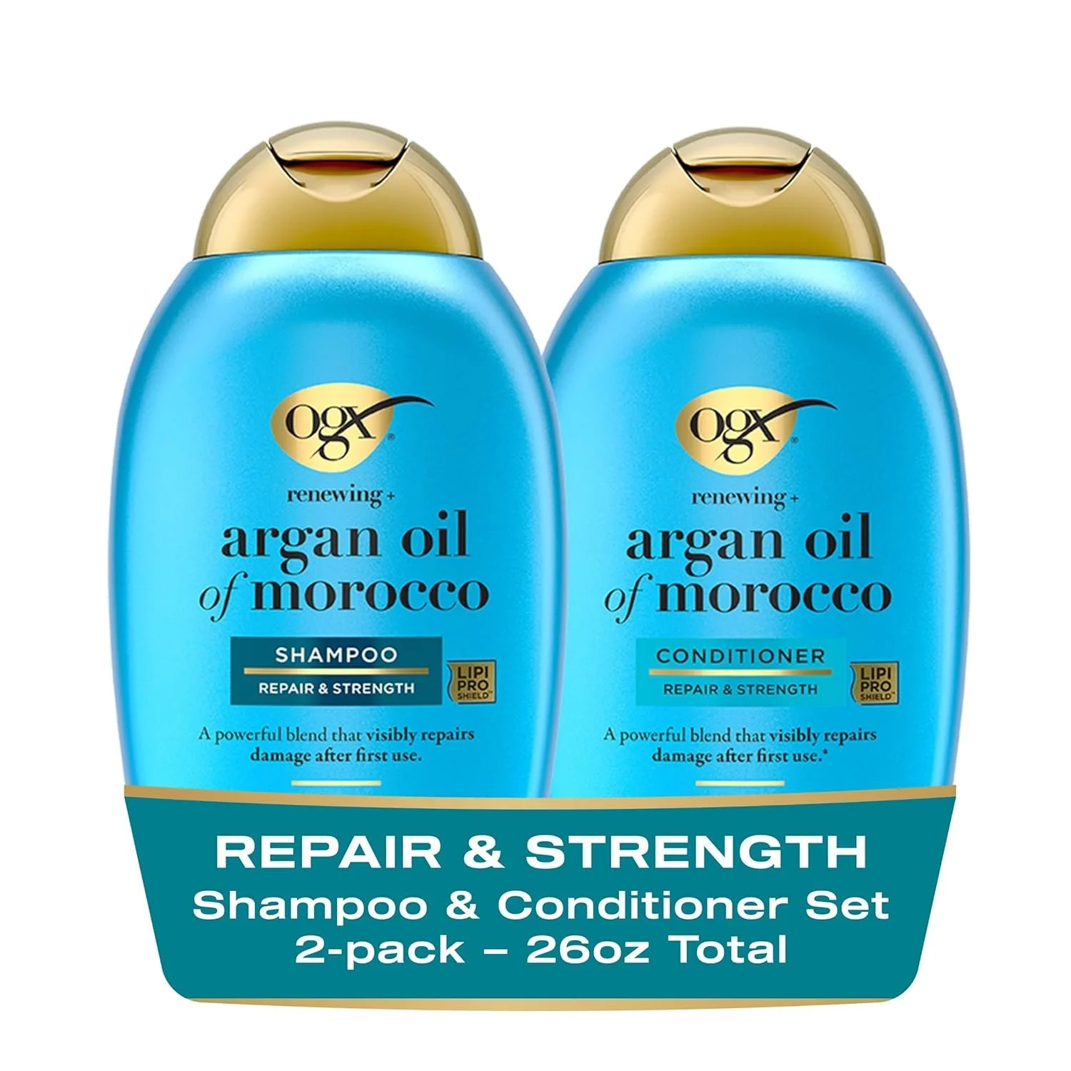 A two-pack set of OGX repairing argan oil of Morocco shampoo and conditioner bottles, blue with gold caps and labels, advertising repair and strength for hair, totaling 26 ounces.